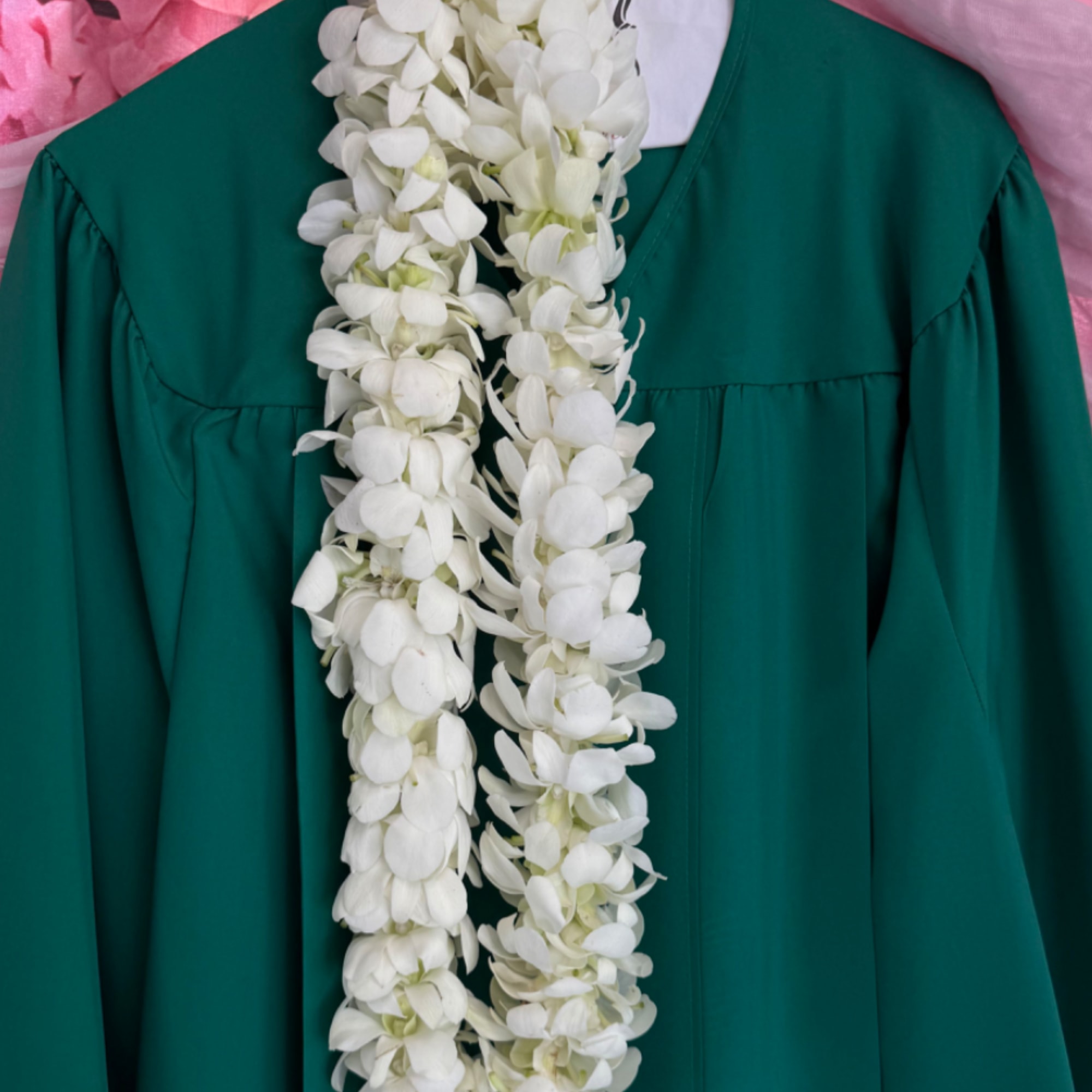 Graduation lei, need to call for color availability. Some colors include white