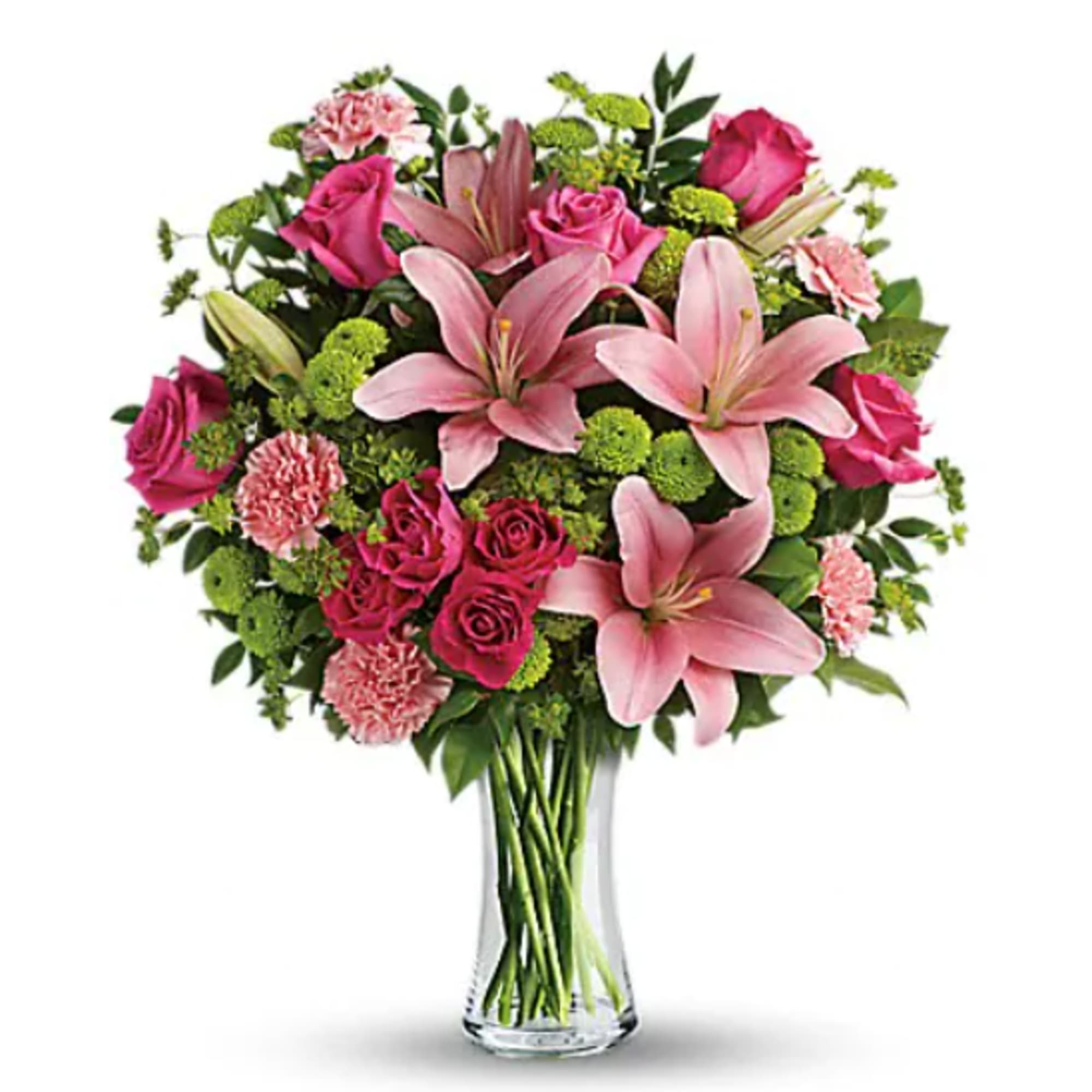 Pink lilies and roses arranged in a clear glass vase