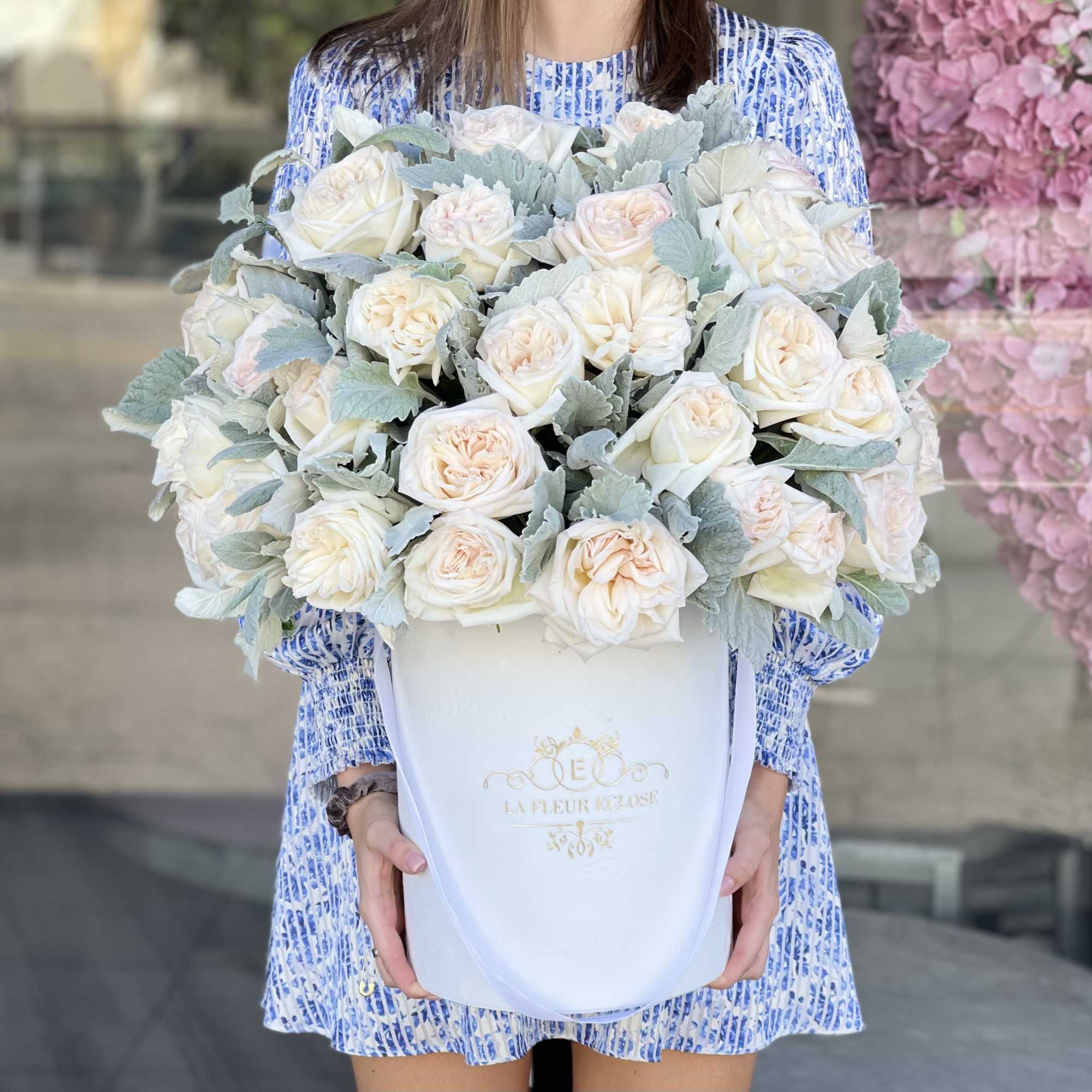 Beautiful garden roses in our signature white velvet box