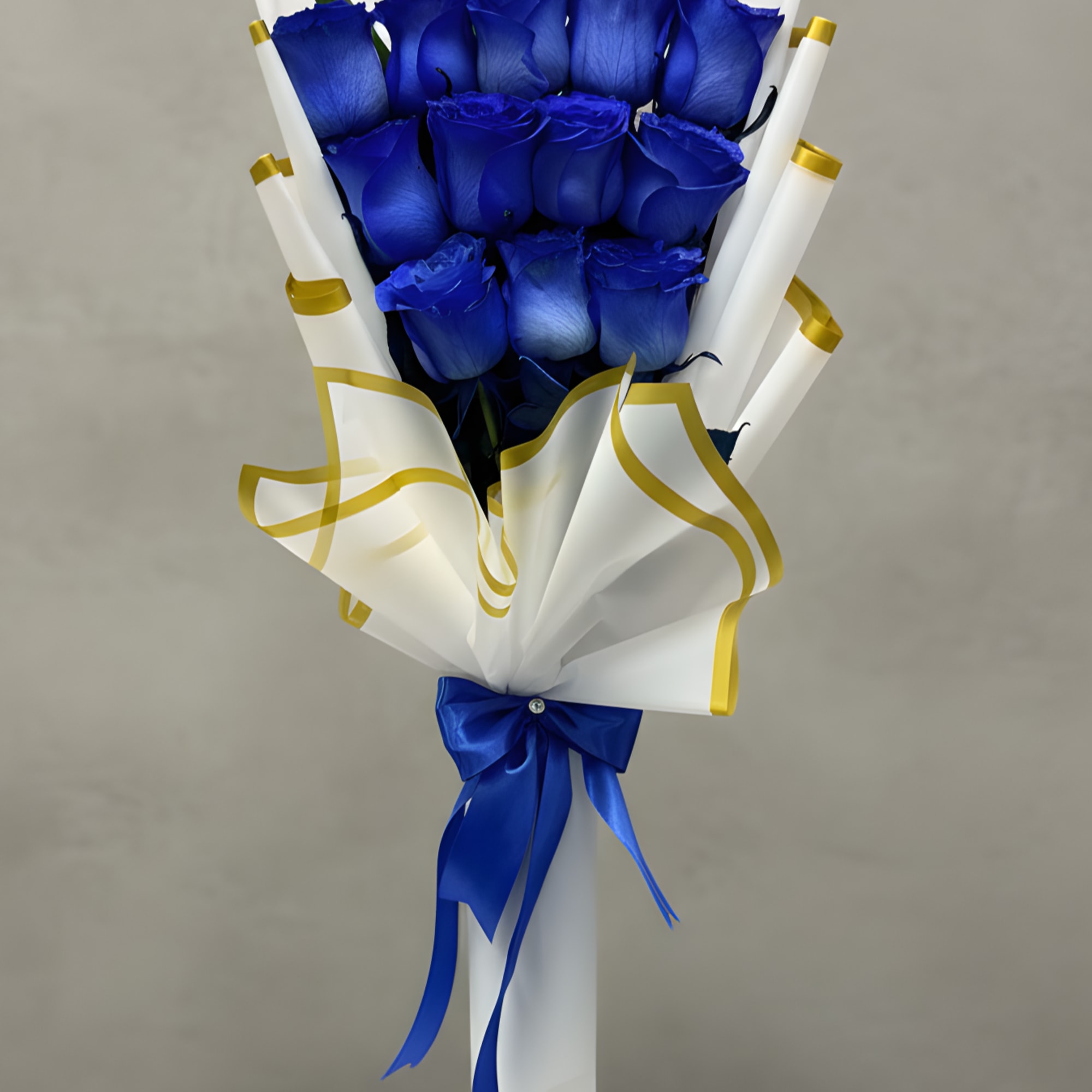 A captivating arrangement of fresh blue roses, elegantly wrapped and tied with