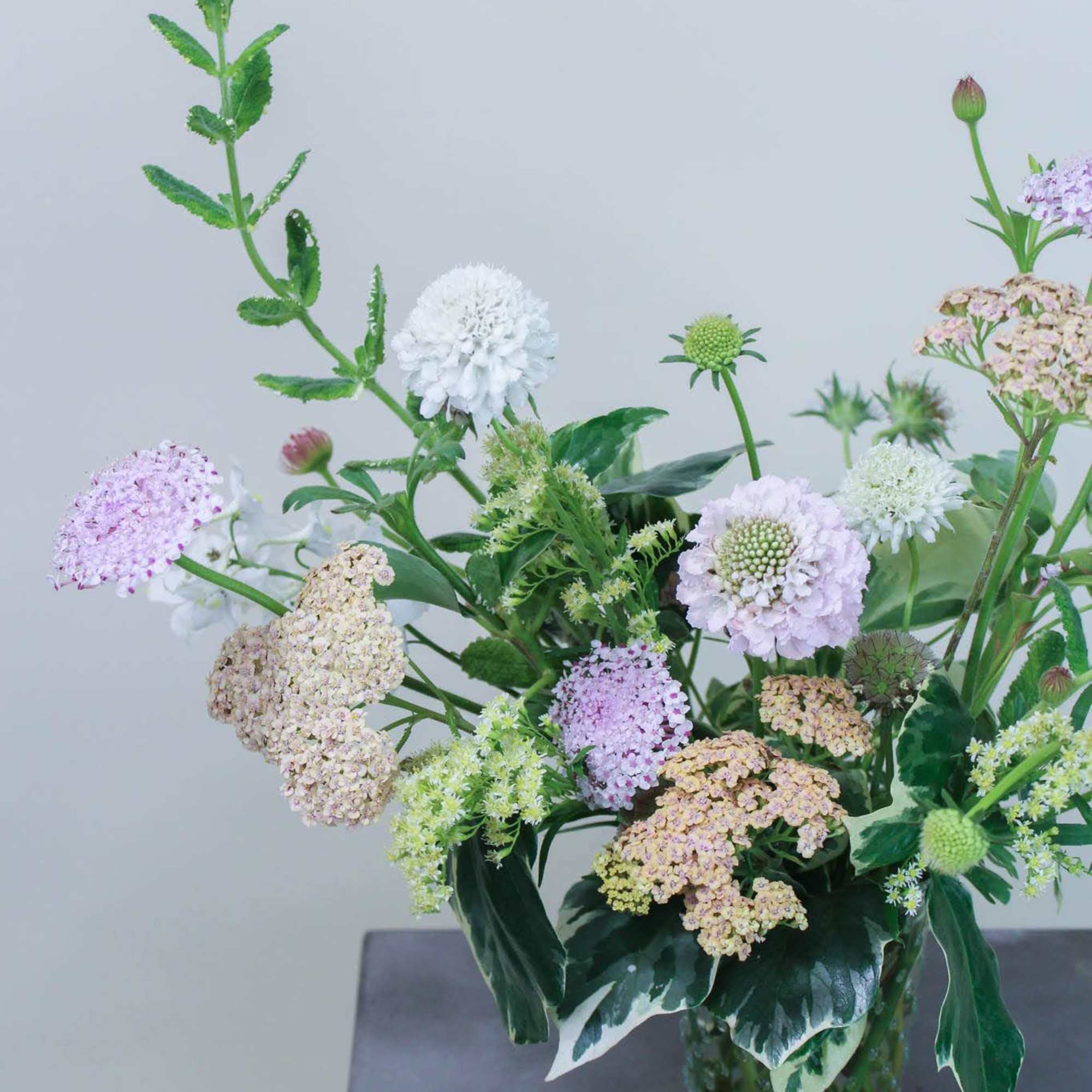 Using texture, shape and color, this small wild flower bouquet is perfect