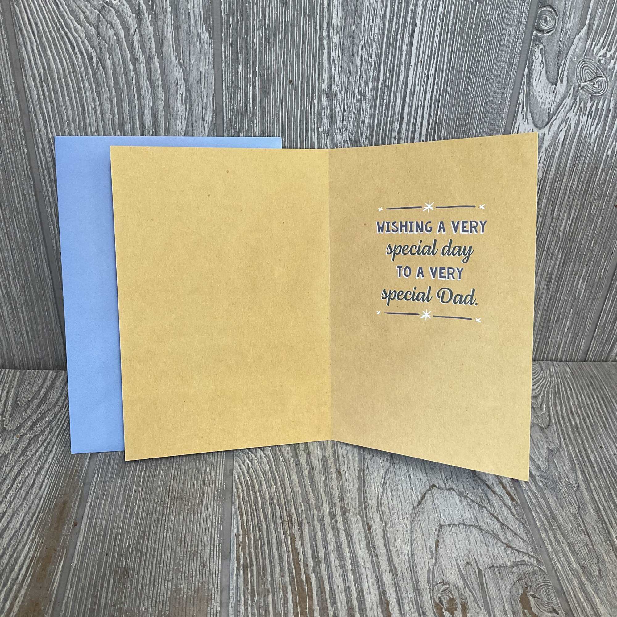 A warm, rustic Father's Day greeting card that says "It Takes Someone