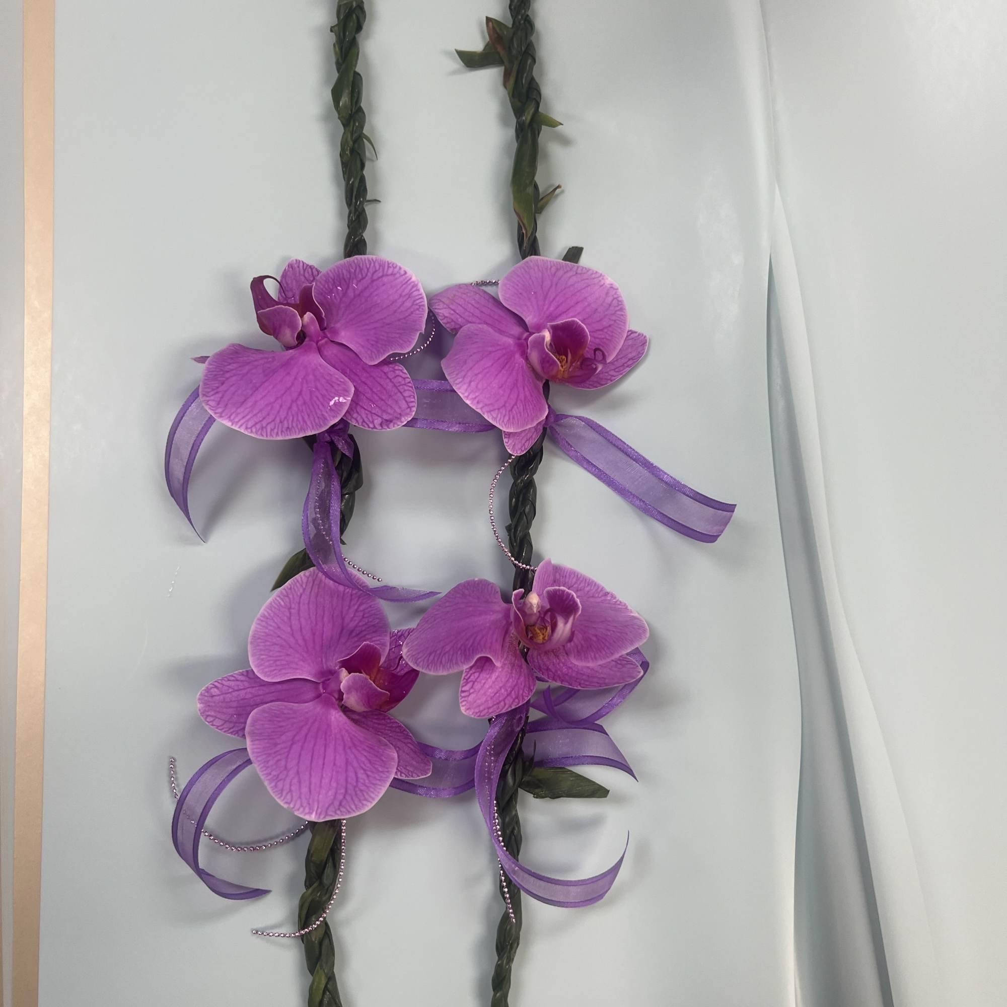 Hawaiian Ti Leaf hand tied Lei with orchids 