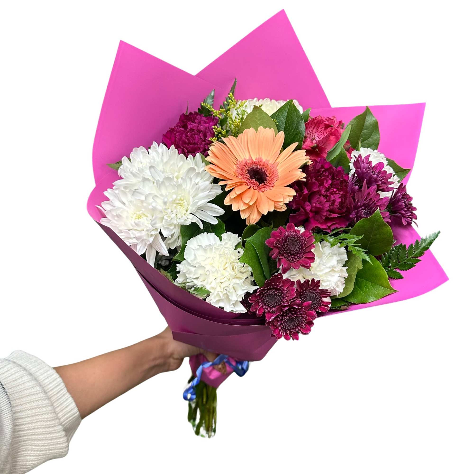 Hand held bouquet with our freshest mix florals. A bright colorful bouquet