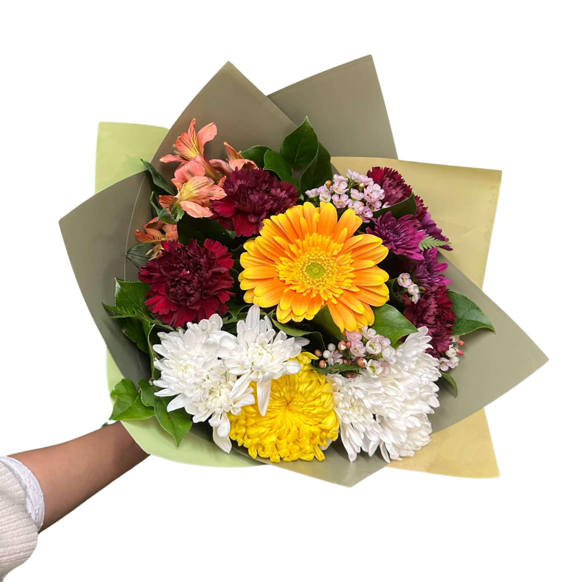 Hand held bouquet with our freshest mix florals. A bright colorful bouquet