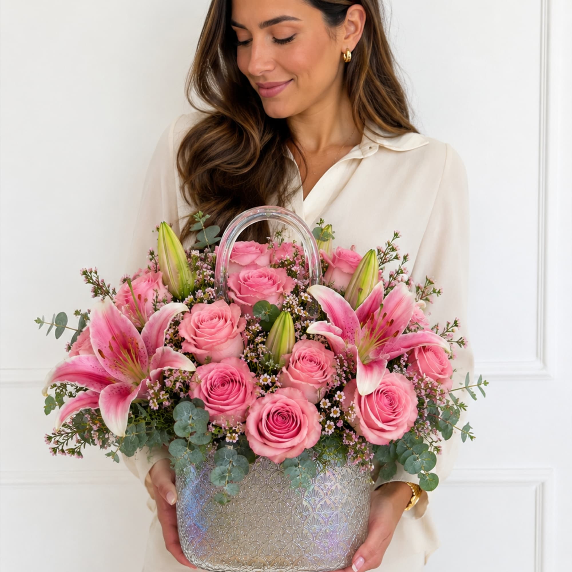 Celebrate Mom with elegance and timeless beauty. Our exclusive floral purse arrangements