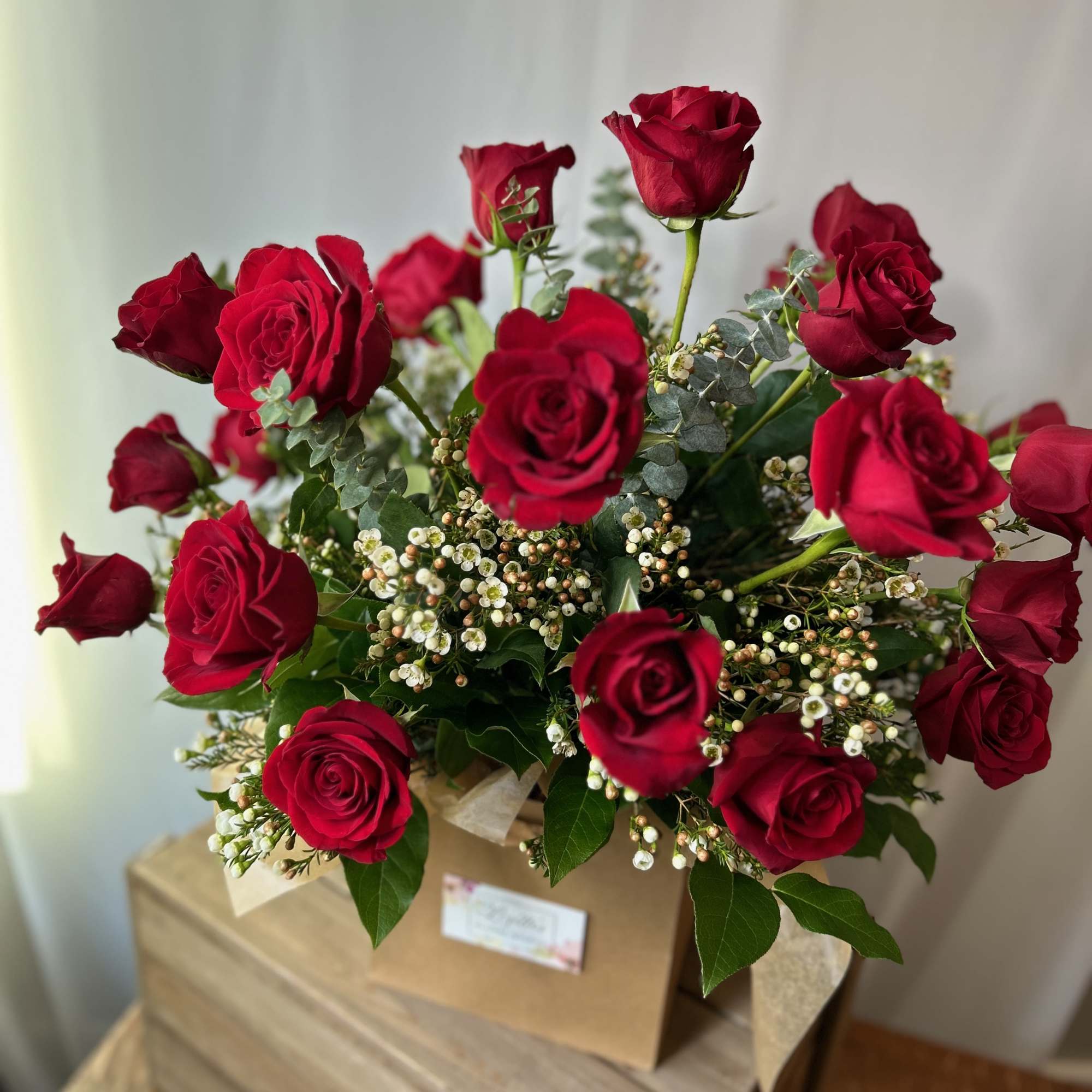 Classic roses beautifully arranged in a vase, perfect for birthdays, anniversaries, romance