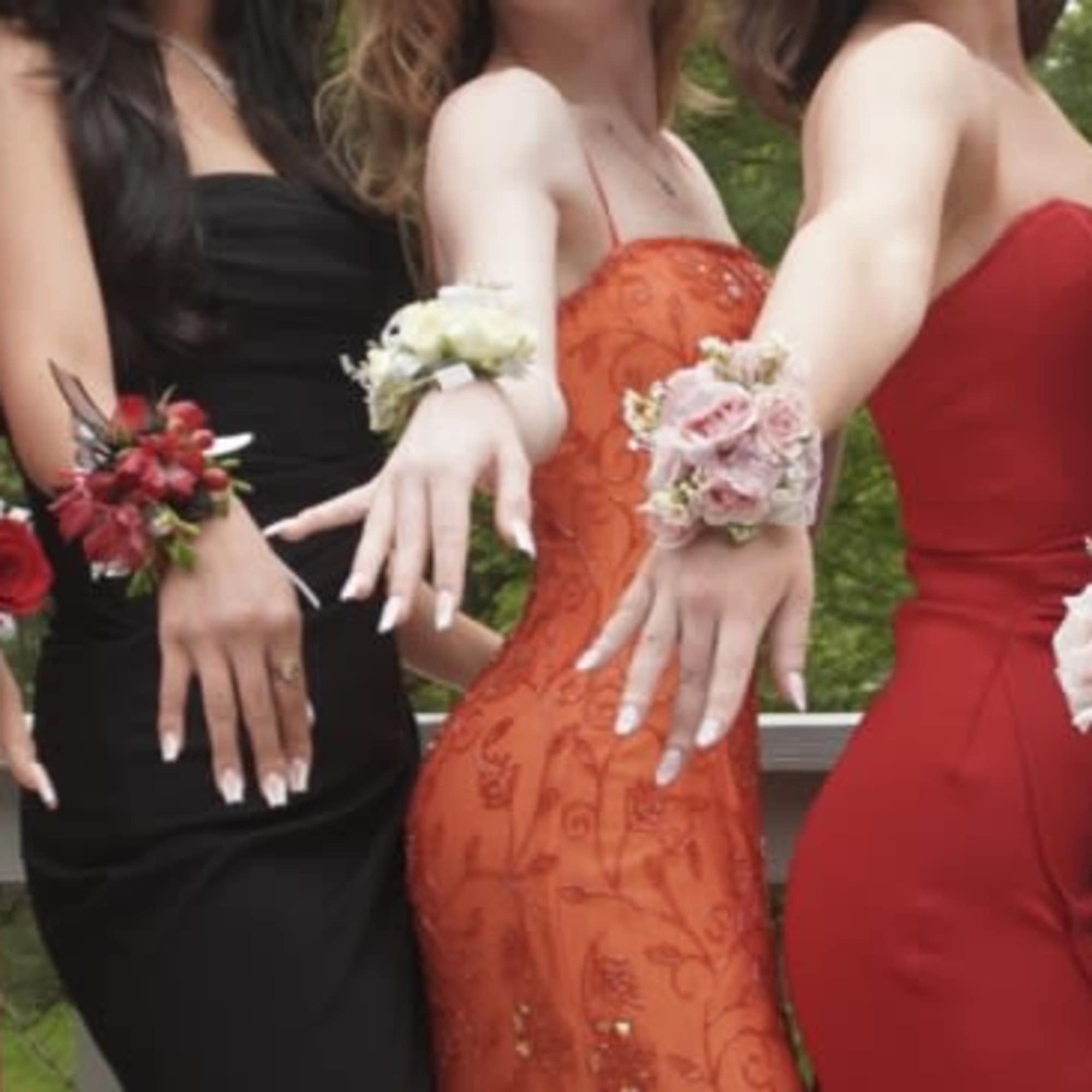 Delicately crafted corsages made with fresh mini roses, filler, small touches of