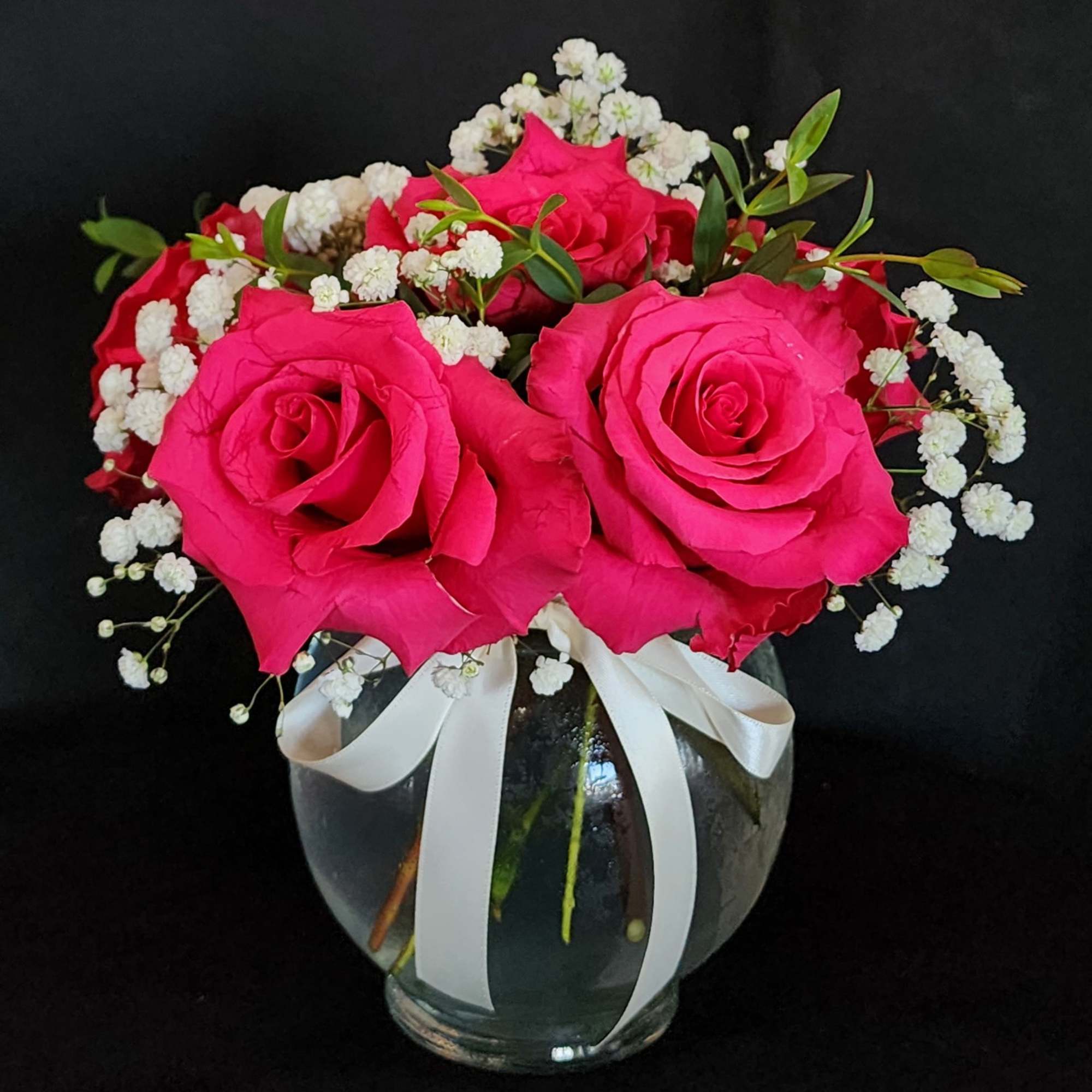 Half a dozen, 1 dozen, 2 dozen roses with greens and fillers