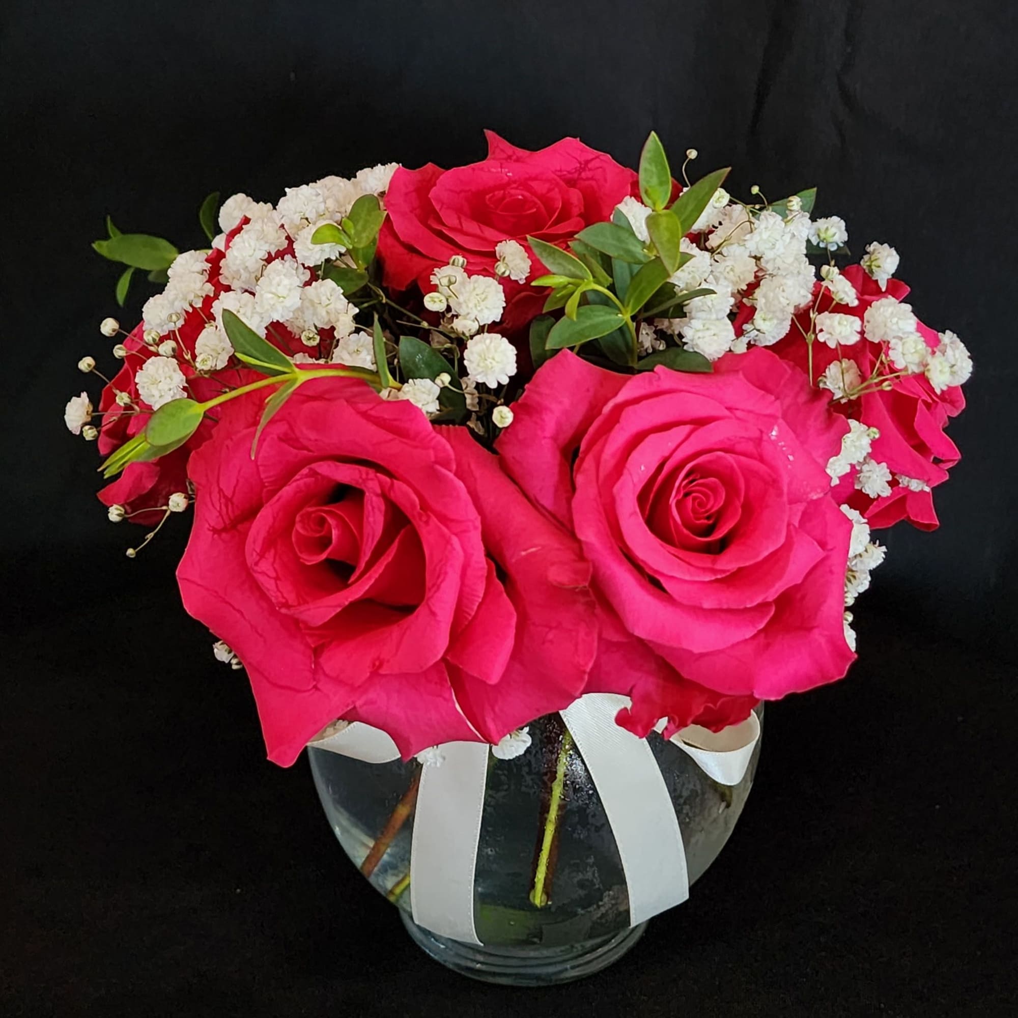 Half a dozen, 1 dozen, 2 dozen roses with greens and fillers