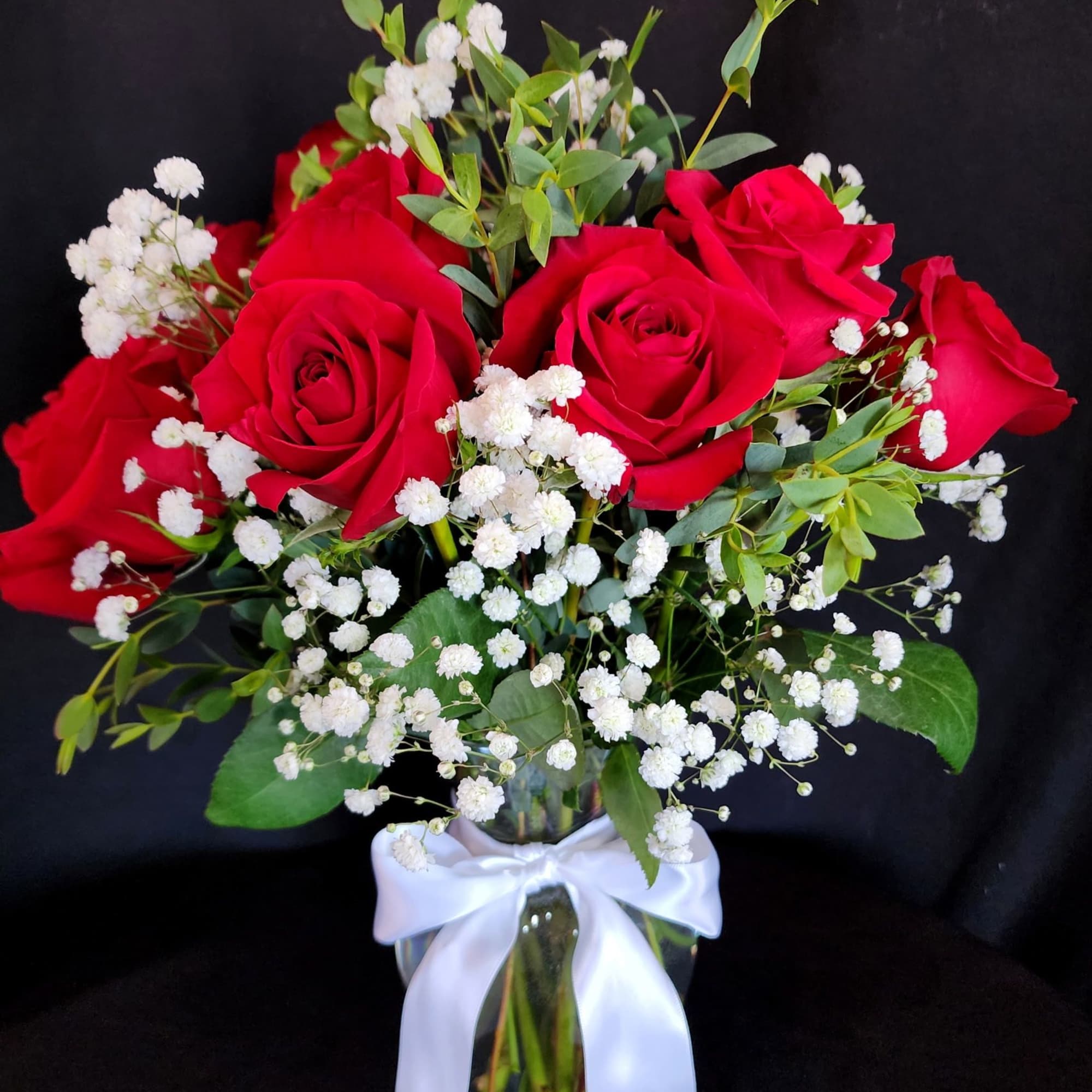 Half a dozen, 1 dozen, 2 dozen roses with greens and fillers