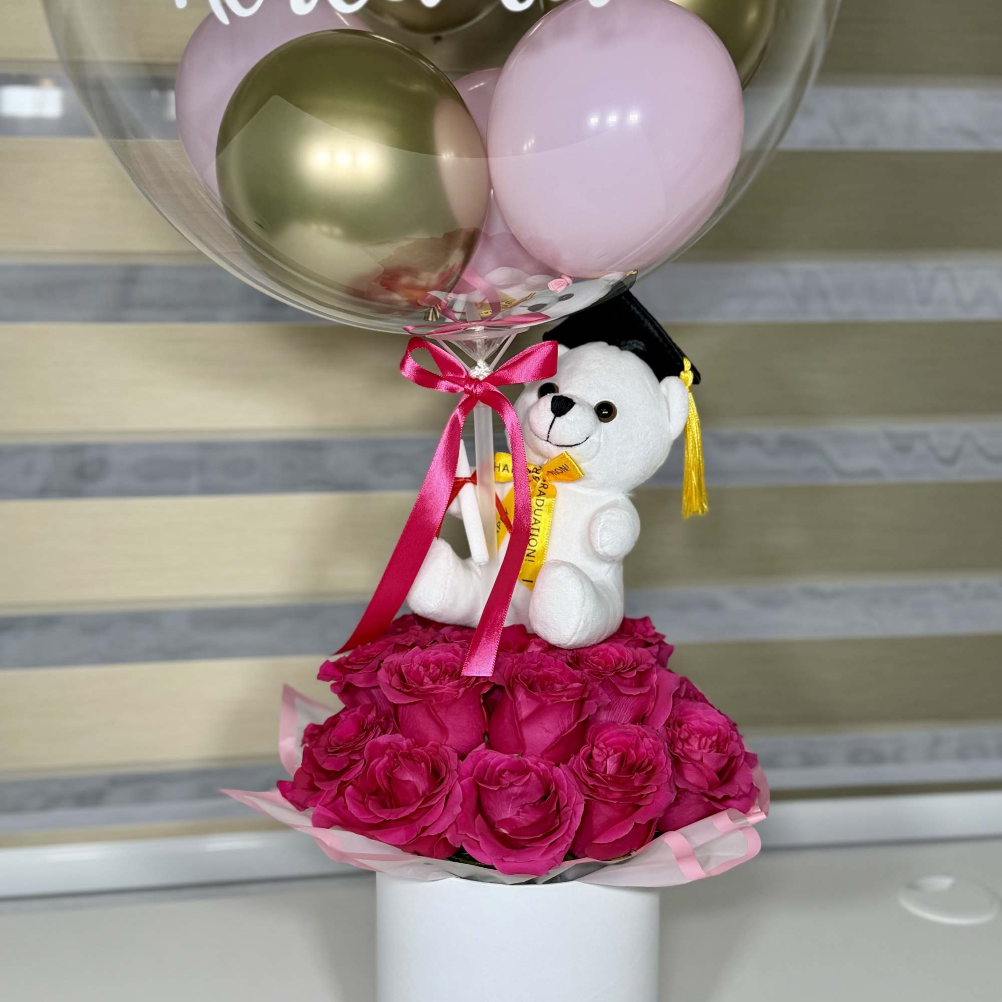 Celebrate her big achievement with Sweet Success. A beautiful graduation arrangement featuring