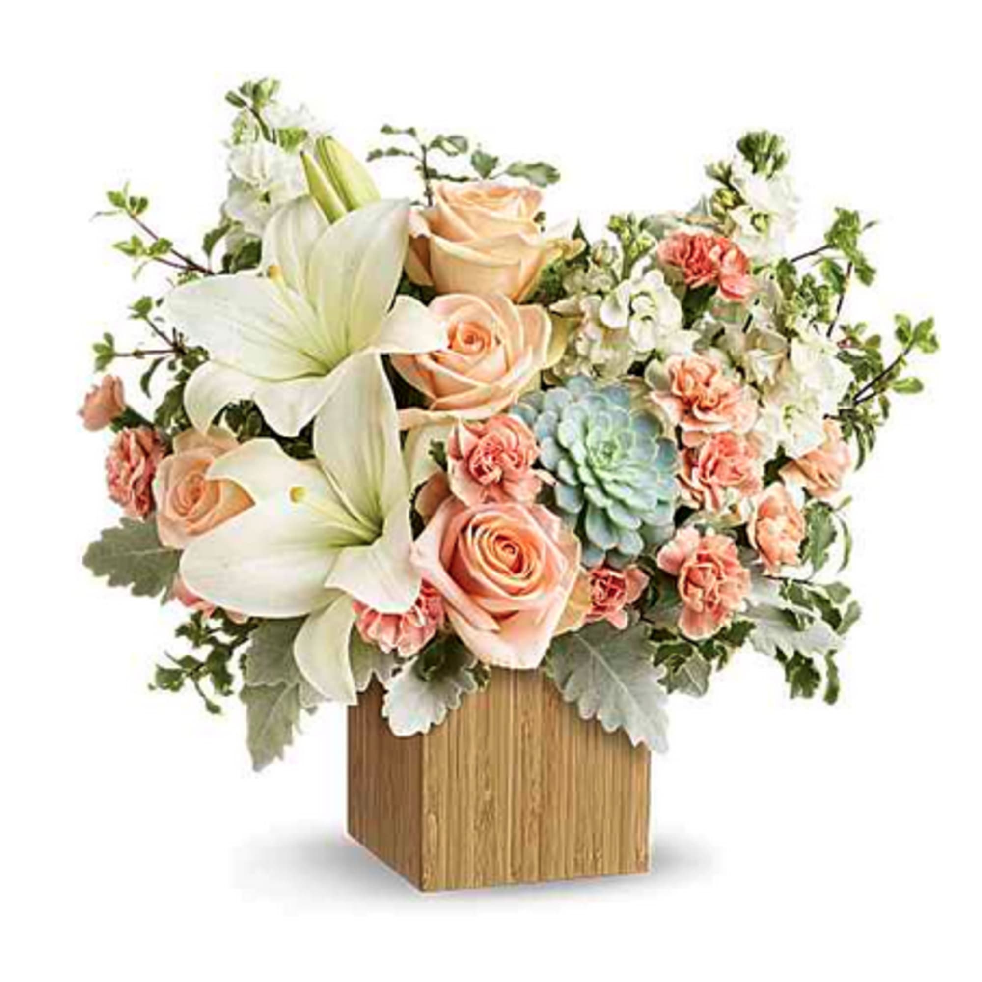 Reminiscent of a desert sunrise, this modern mix of peach blooms, white