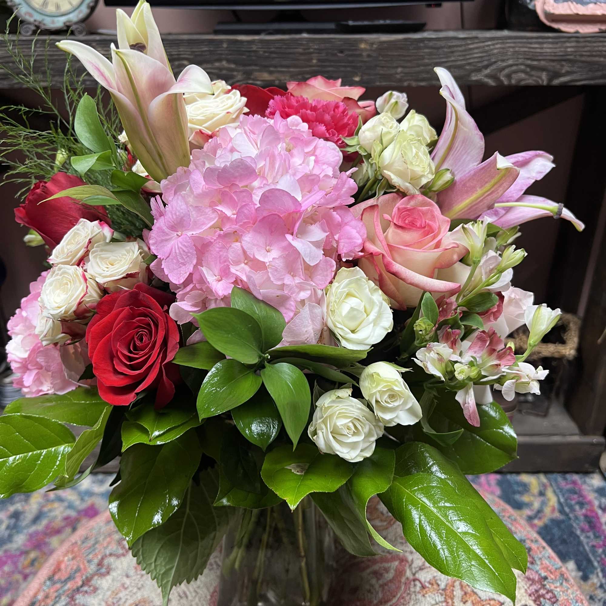 Pink and white mixed bouquet in a glass vase