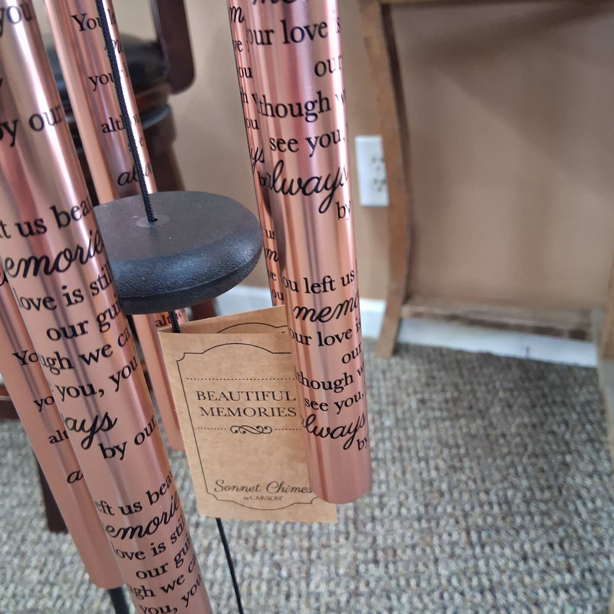 A rose-gold memorial wind chime that reads like a quiet tribute -