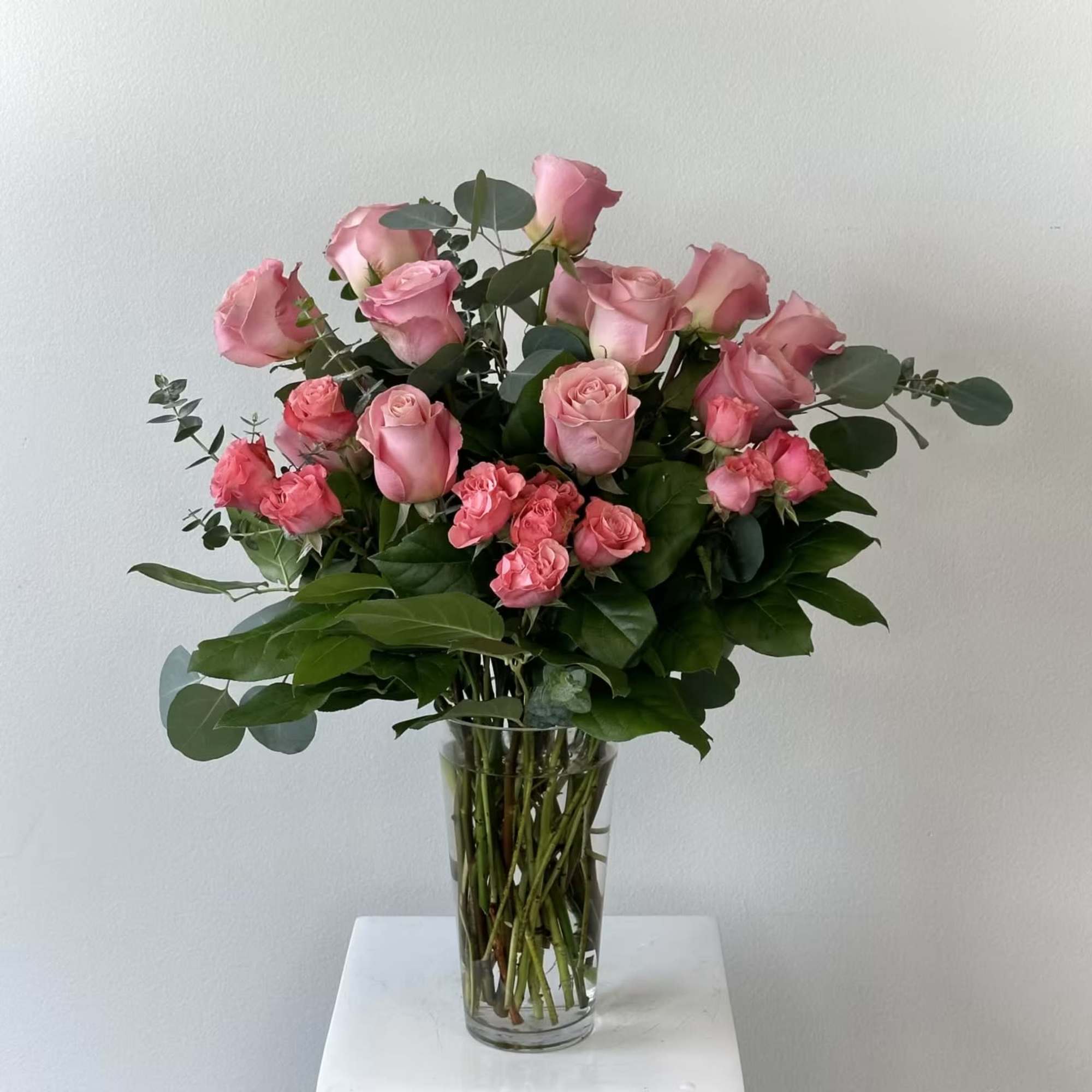 Discover the timeless elegance of our Dozen Pink Roses &ndash; a classic