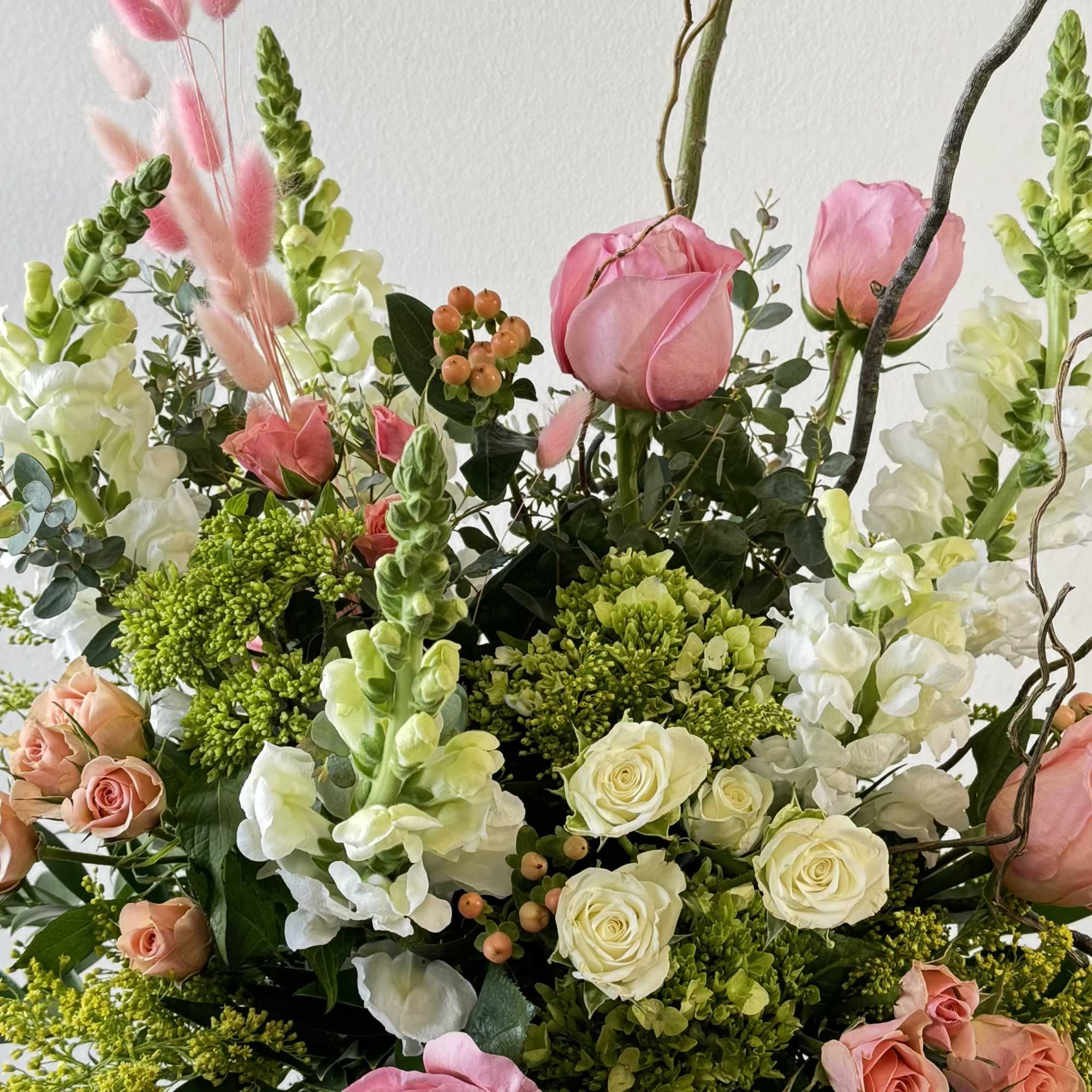 Discover the free-spirited charm of Boho Peach, a whimsical bohemian flower arrangement