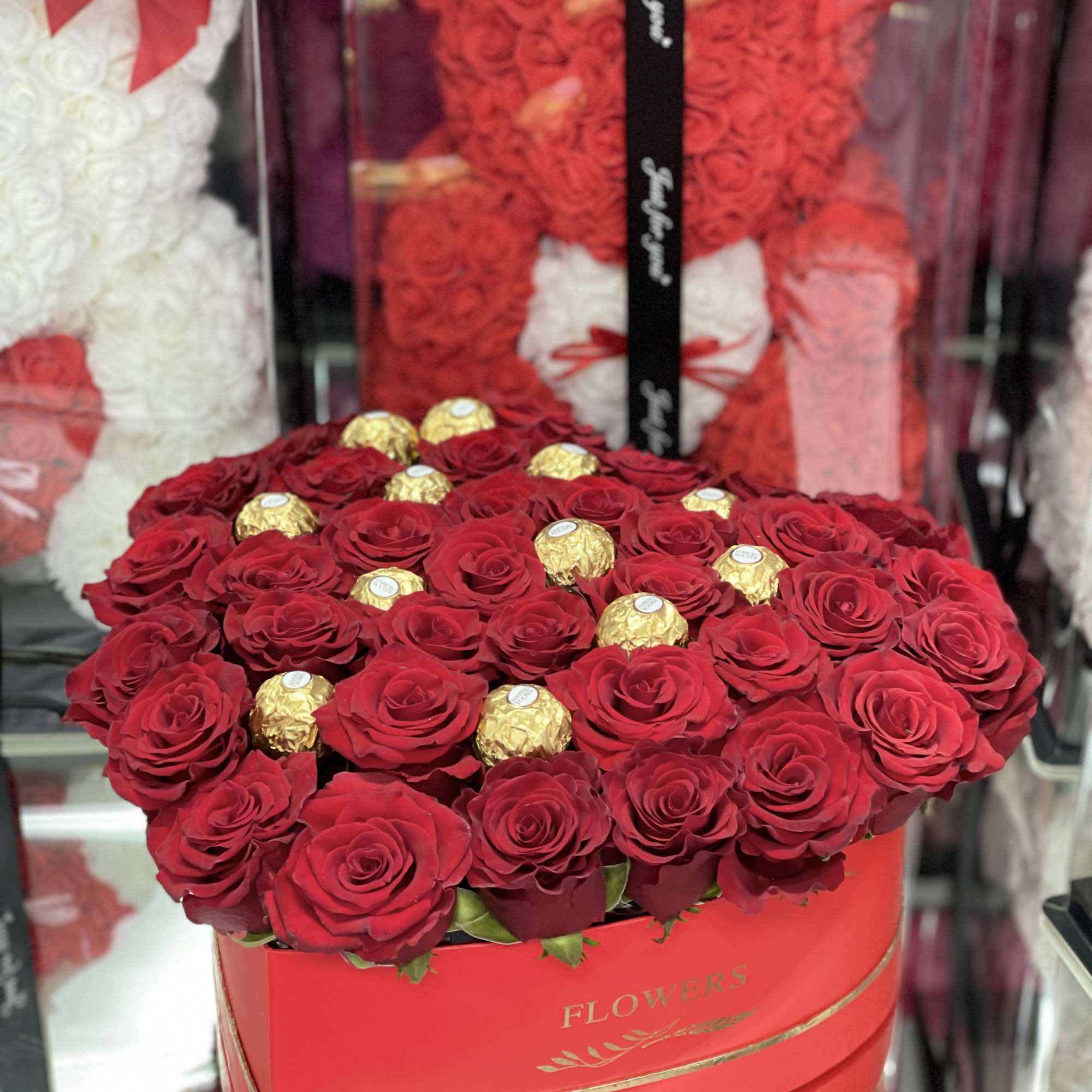 A bold heart-shaped display of 50 fresh roses makes an unforgettable anniversary