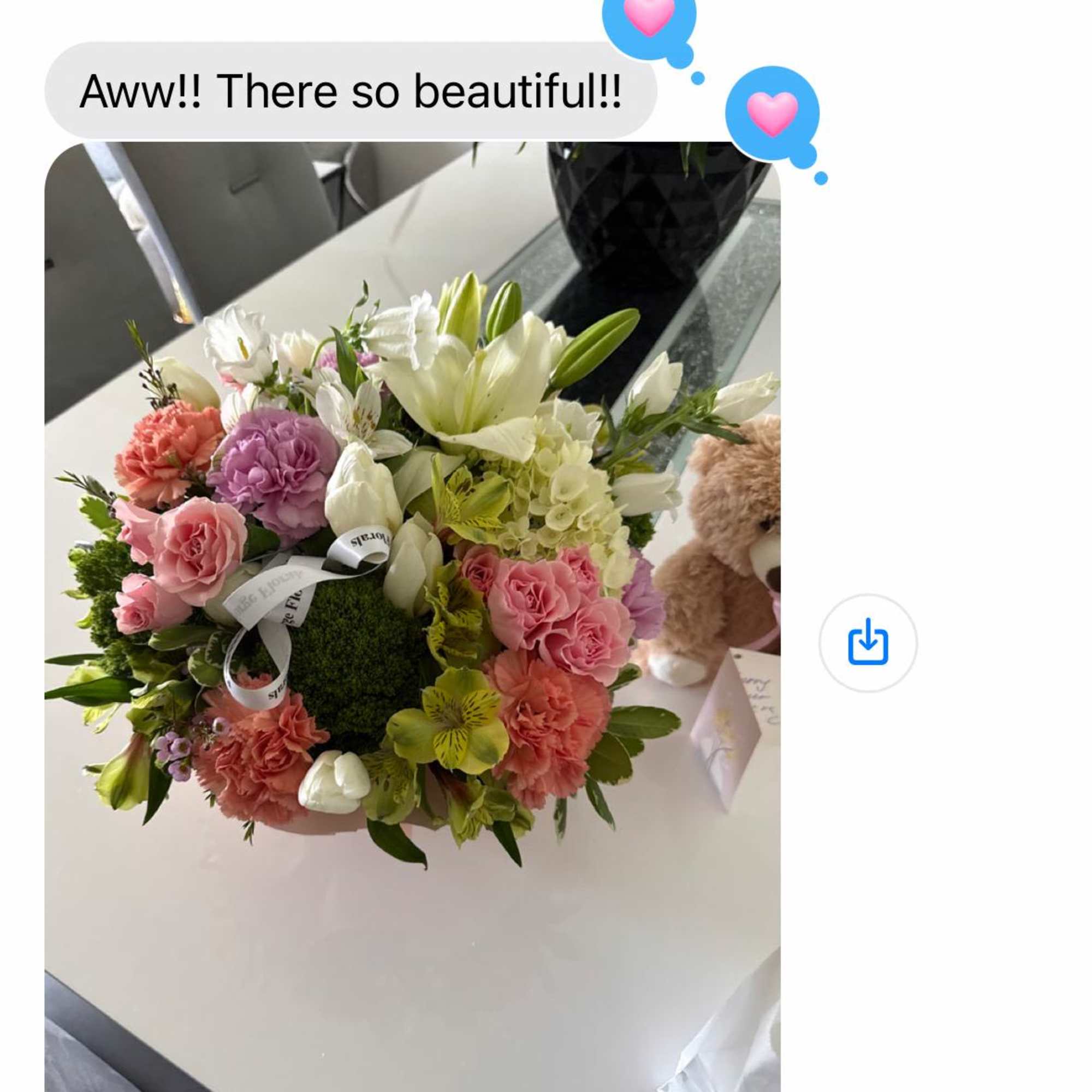 Flower basket with mixed colorful seasonal flowers. Picture is just for reference.