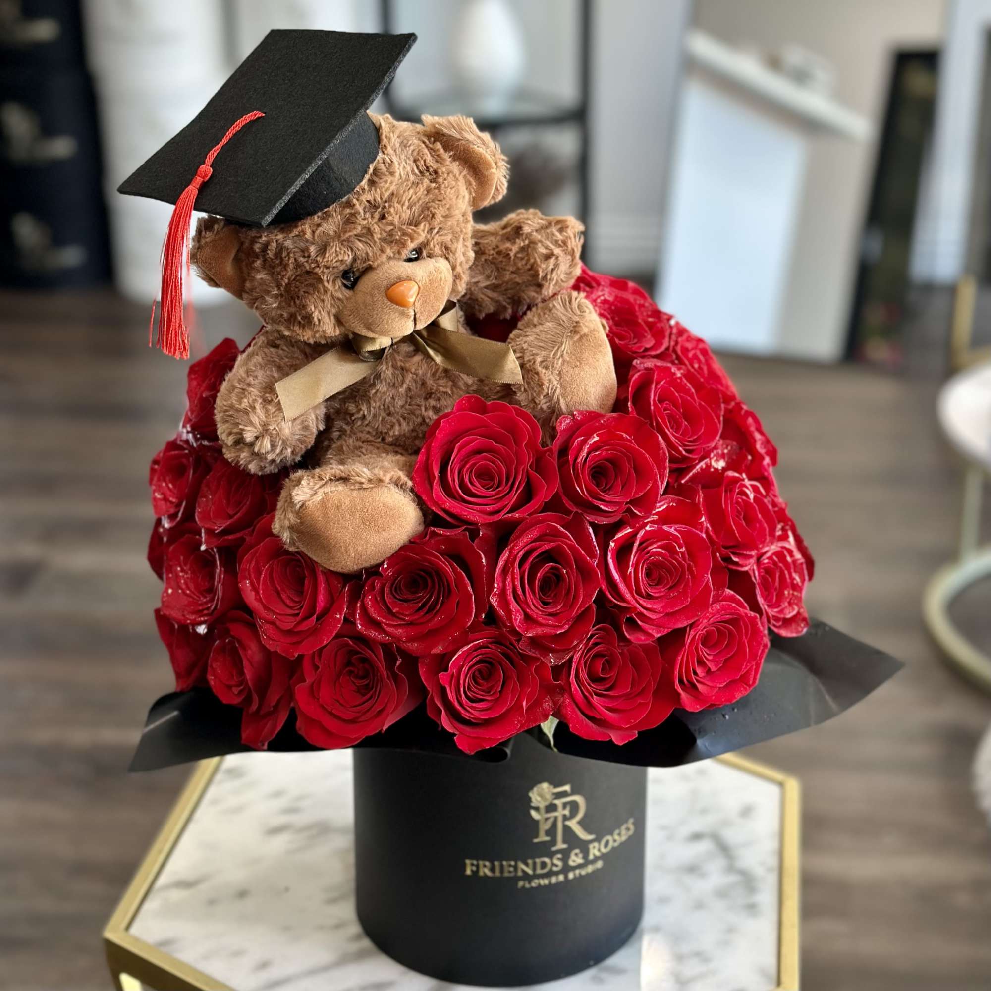 Celebrate their big achievement with The Graduate's Rose Box&mdash;a luxurious arrangement of