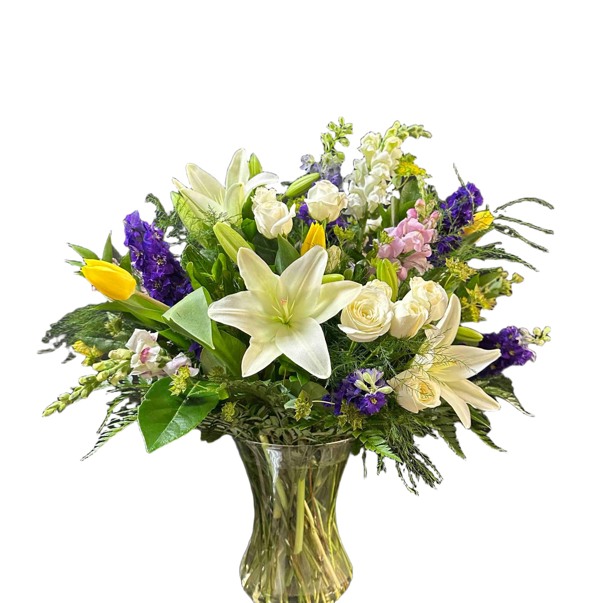 Large, garden-style bouquet of tulips, white lilies and roses with purple, yellow
