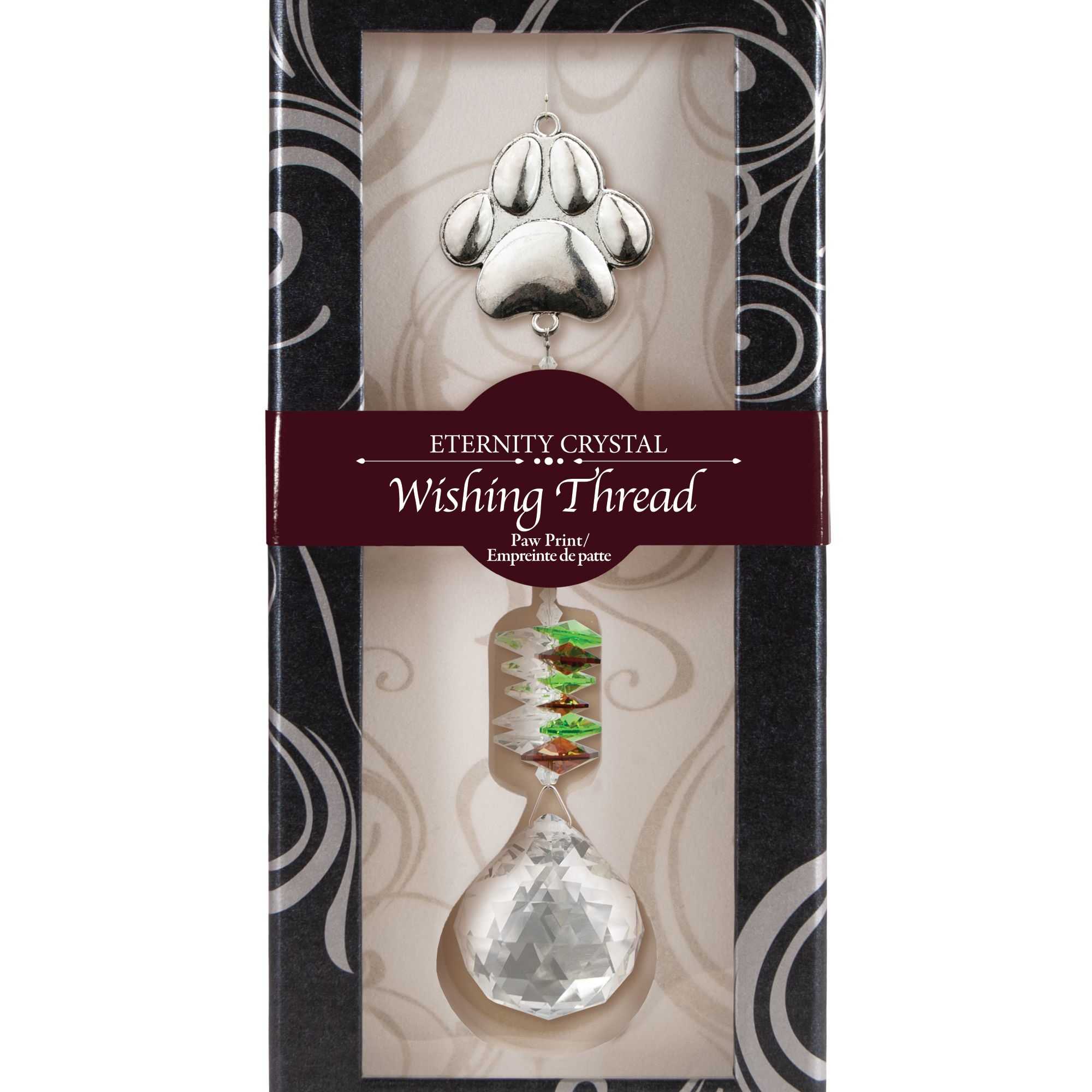 Boxed crystal ornament with silver paw print and faceted teardrop crystal hanging on a thread