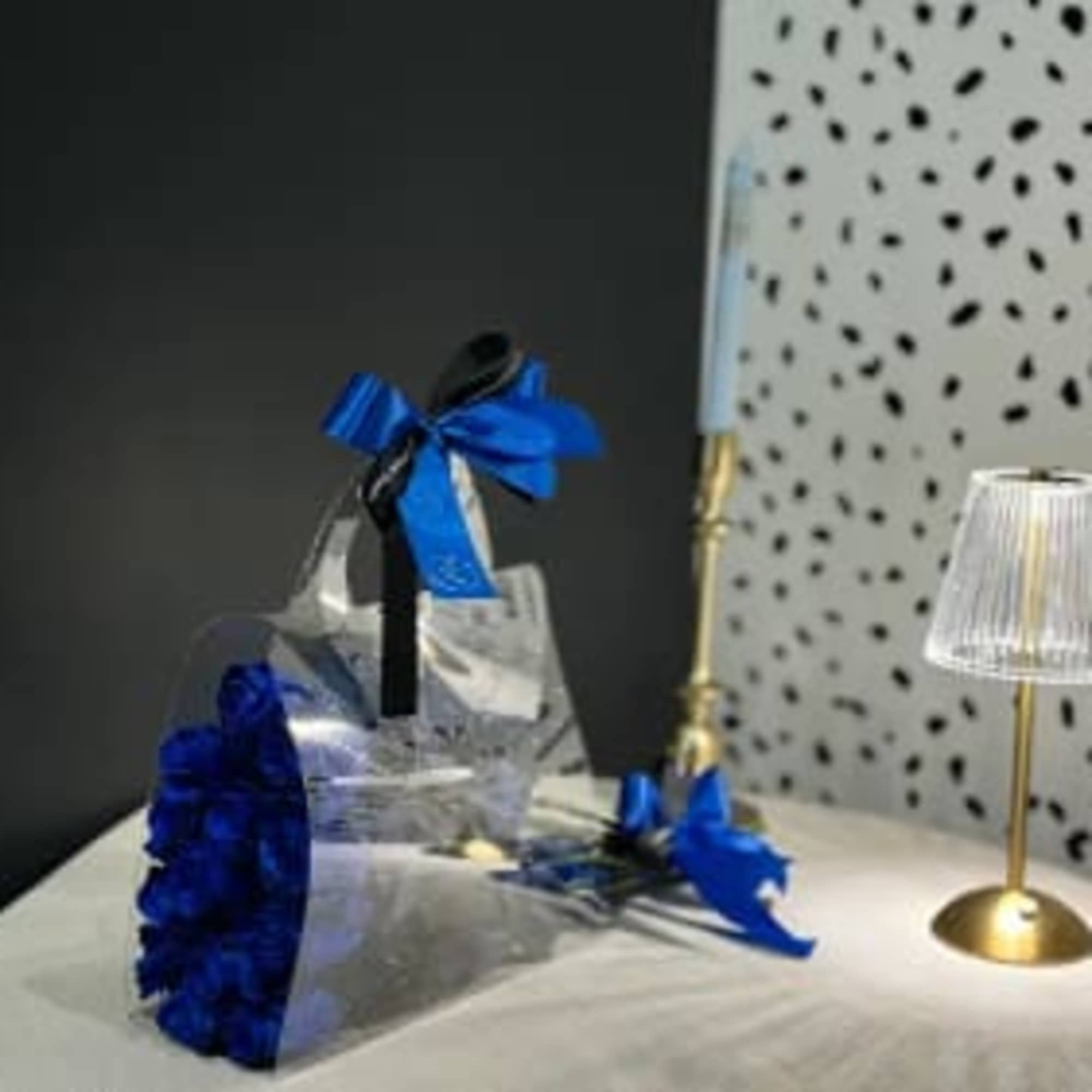A stunning bouquet of blue roses, designed to stand out with its
