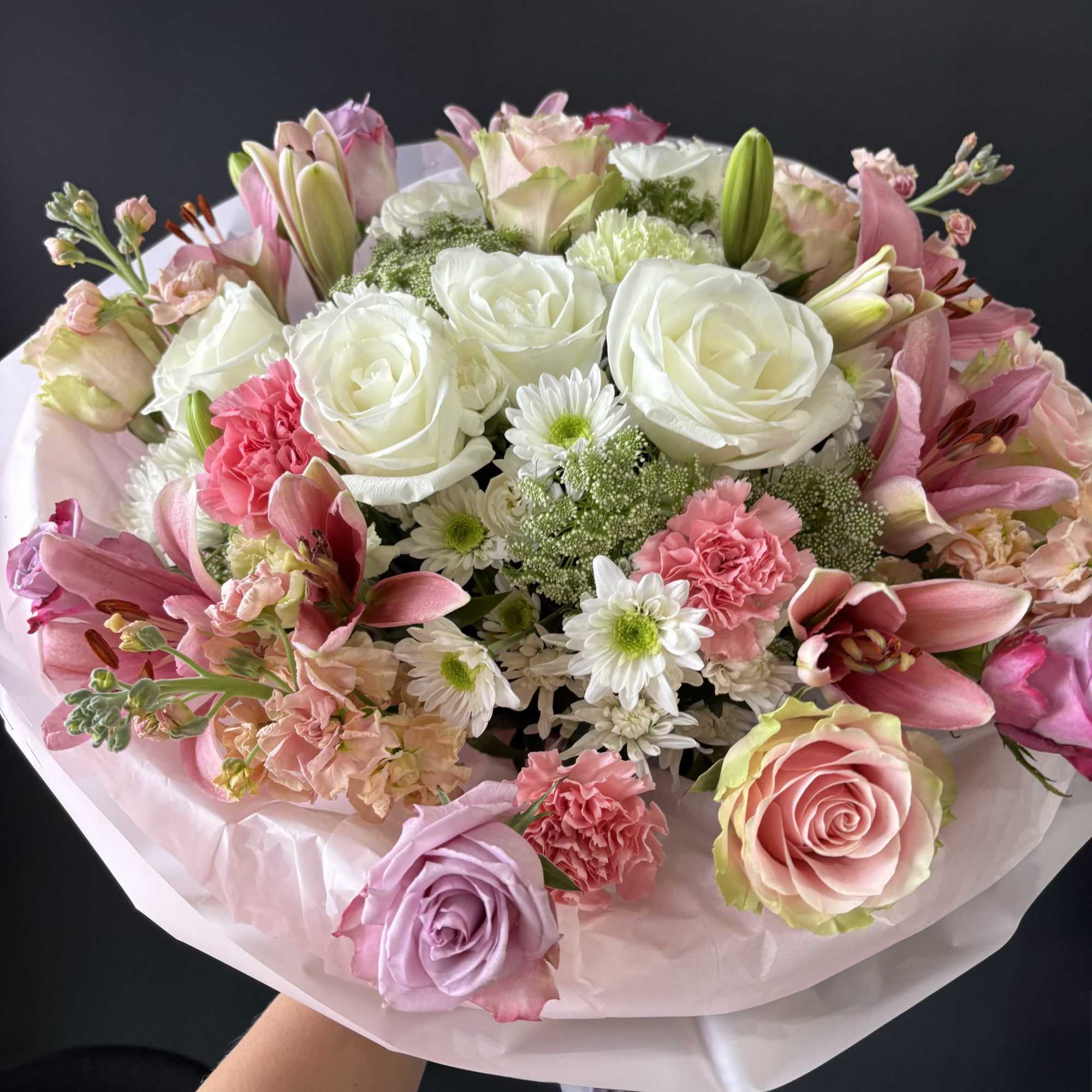 Blush Whisper Elegance is a voluminous, delicately balanced arrangement in shades of