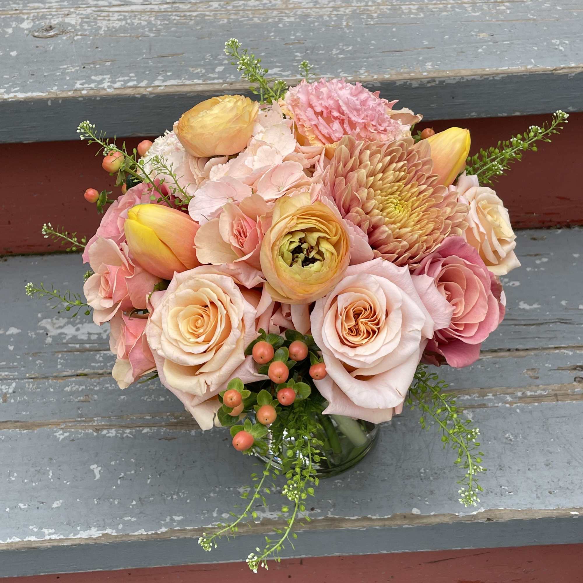 A lovely peach arrangement with a monochromatic peachy pink color scheme. This