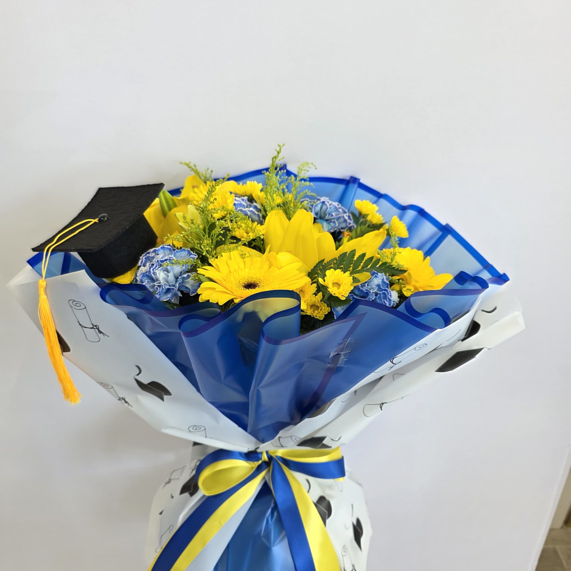Ideal for grads of any age-high school, college, or trade school-this bouquet