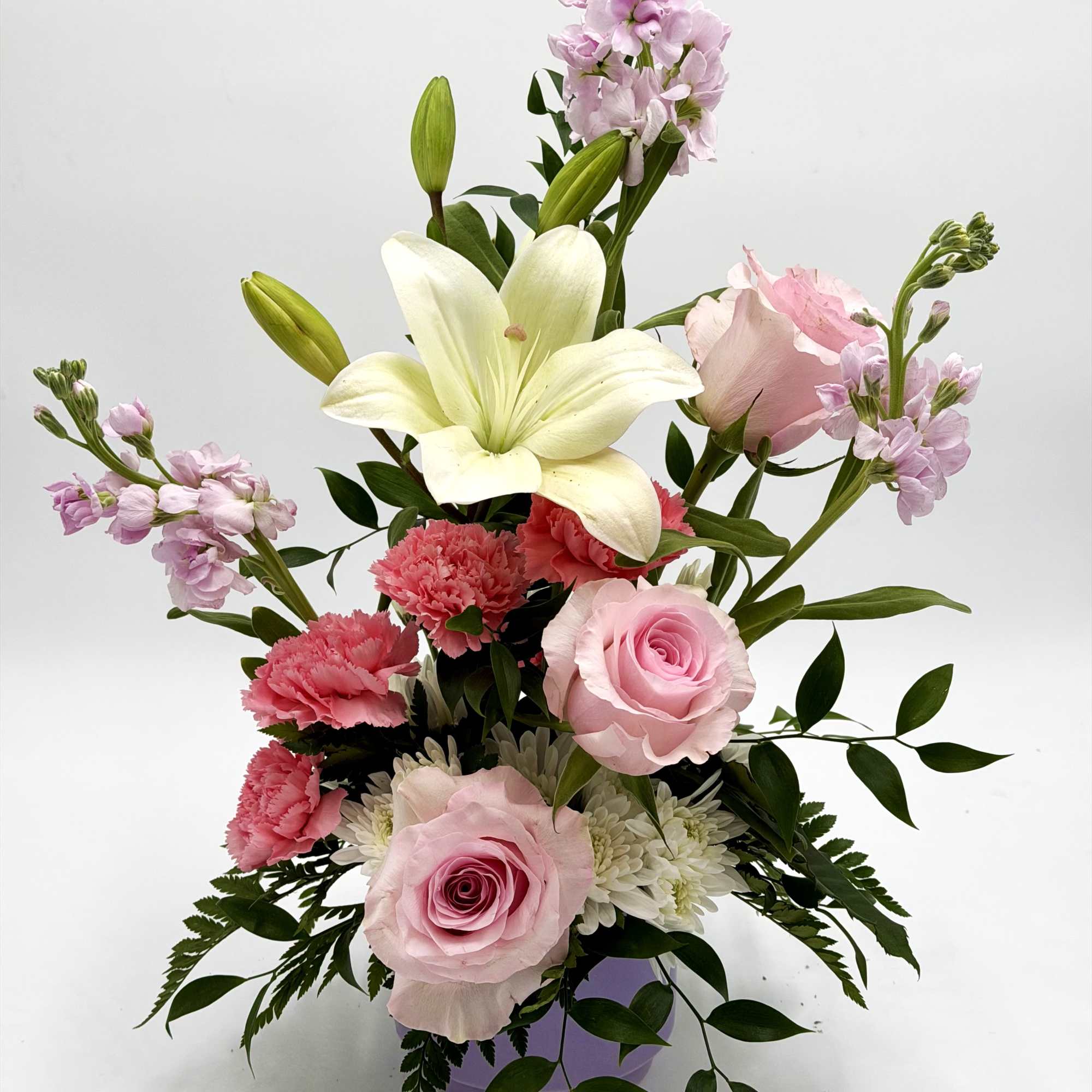 Rosy Daydream is a soft and romantic arrangement designed with delicate shades