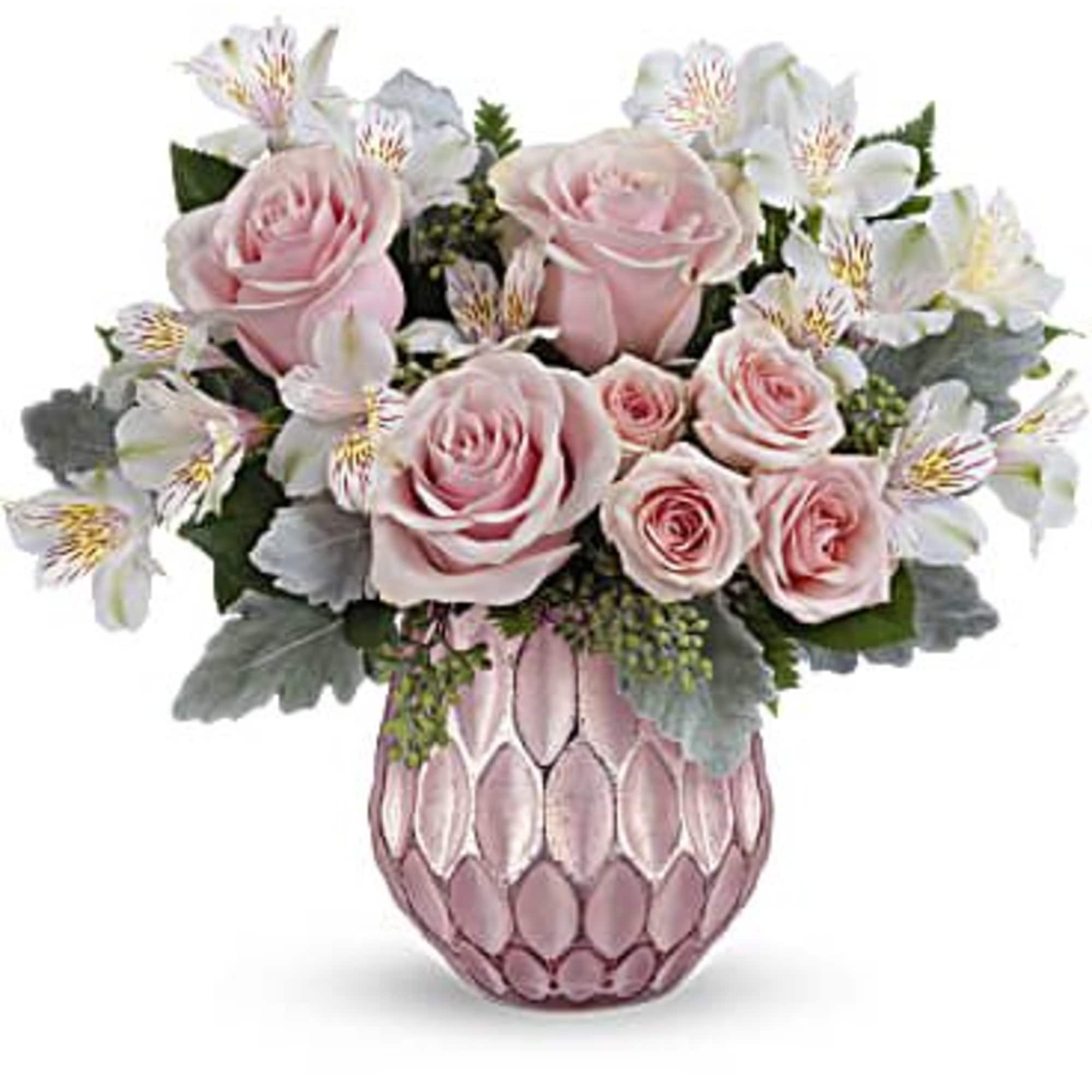 Pink roses and white alstroemeria in a pink textured vase