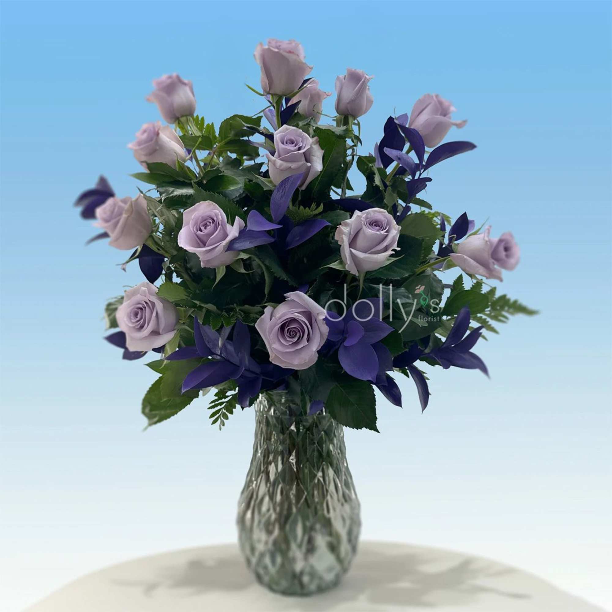 Soft lavender roses arranged in a rounded cluster create a calm, romantic