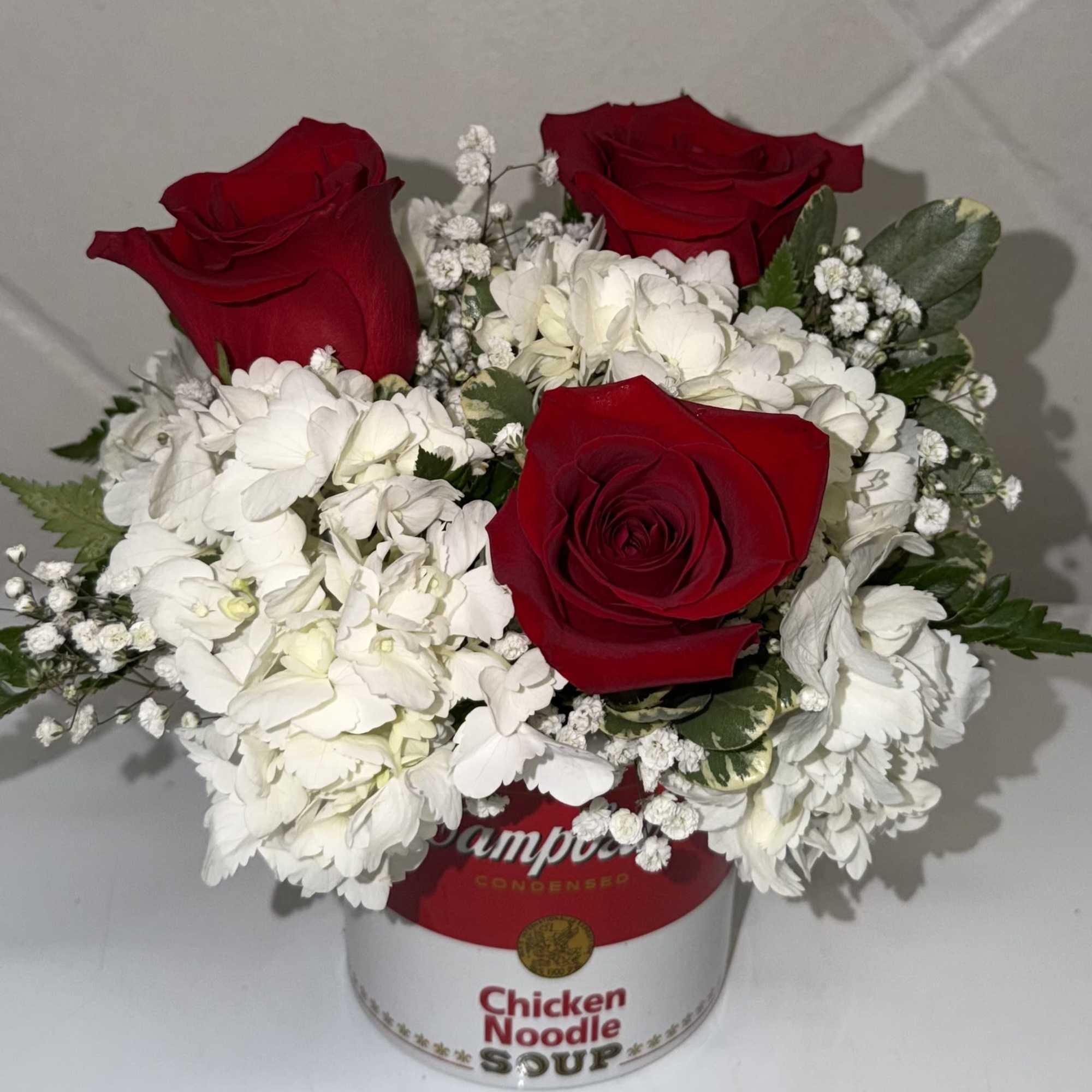 Presented in a stylish Campbell's&reg; Chicken Noodle Soup ceramic mug, this arrangement