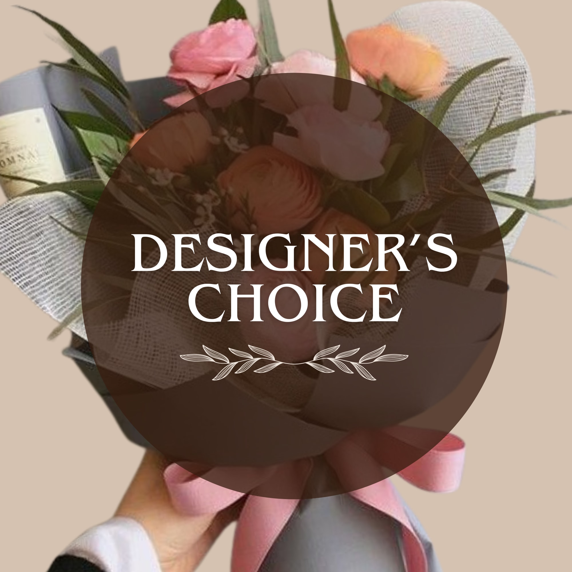 Mixed colored flowers mingle with airy white filler and long, slender greenery