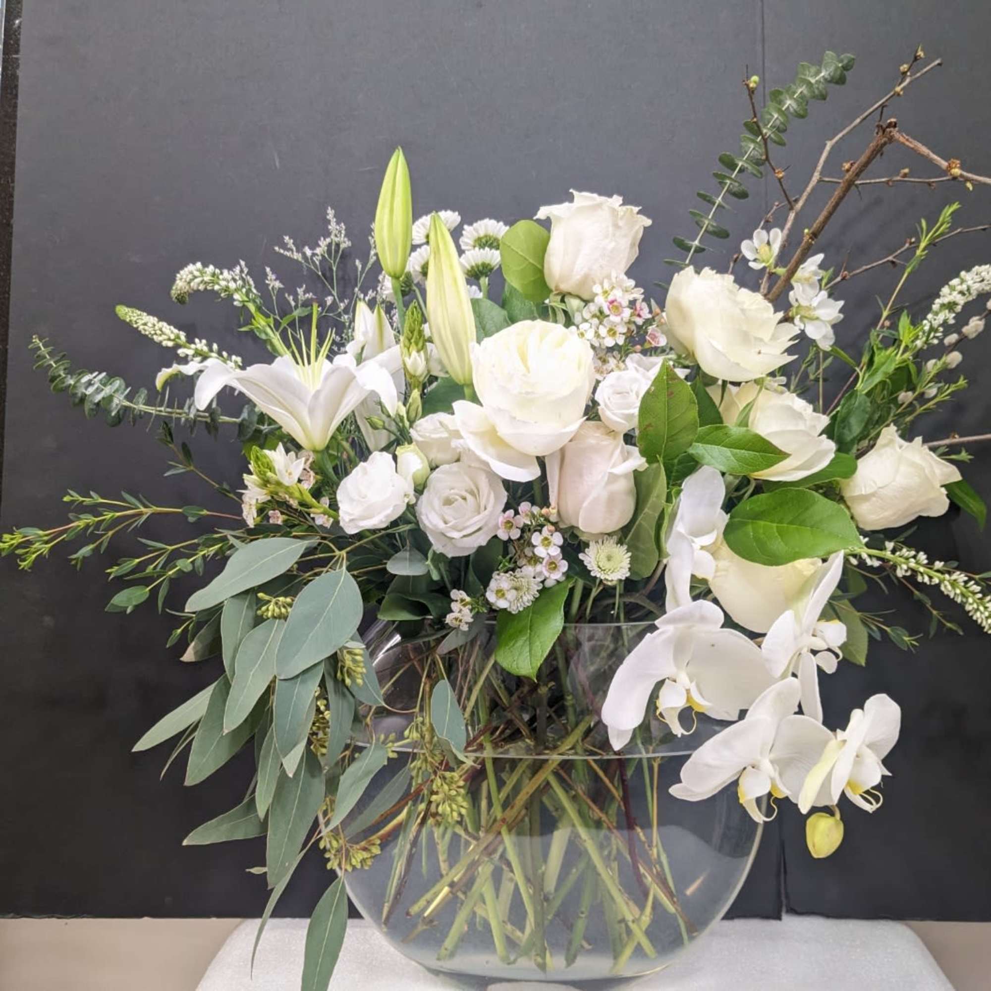 Blush Serenity is a graceful and elegant arrangement designed with white and