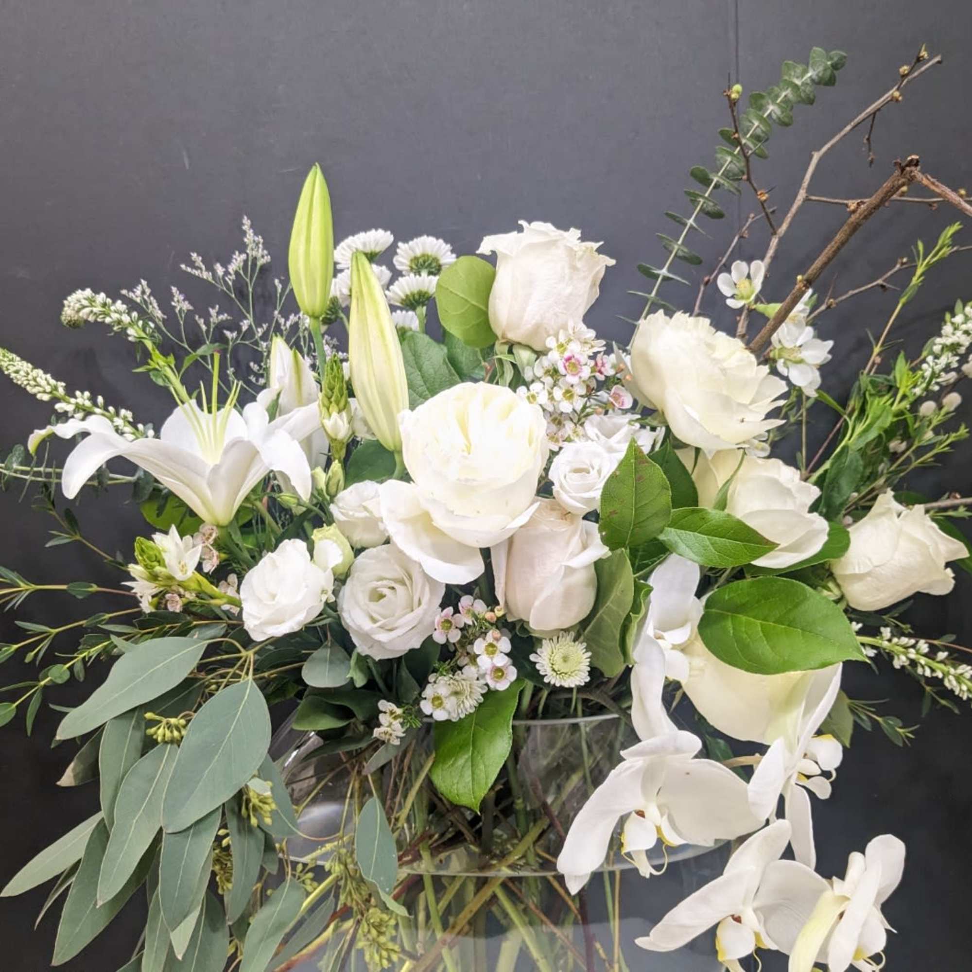 Blush Serenity is a graceful and elegant arrangement designed with white and
