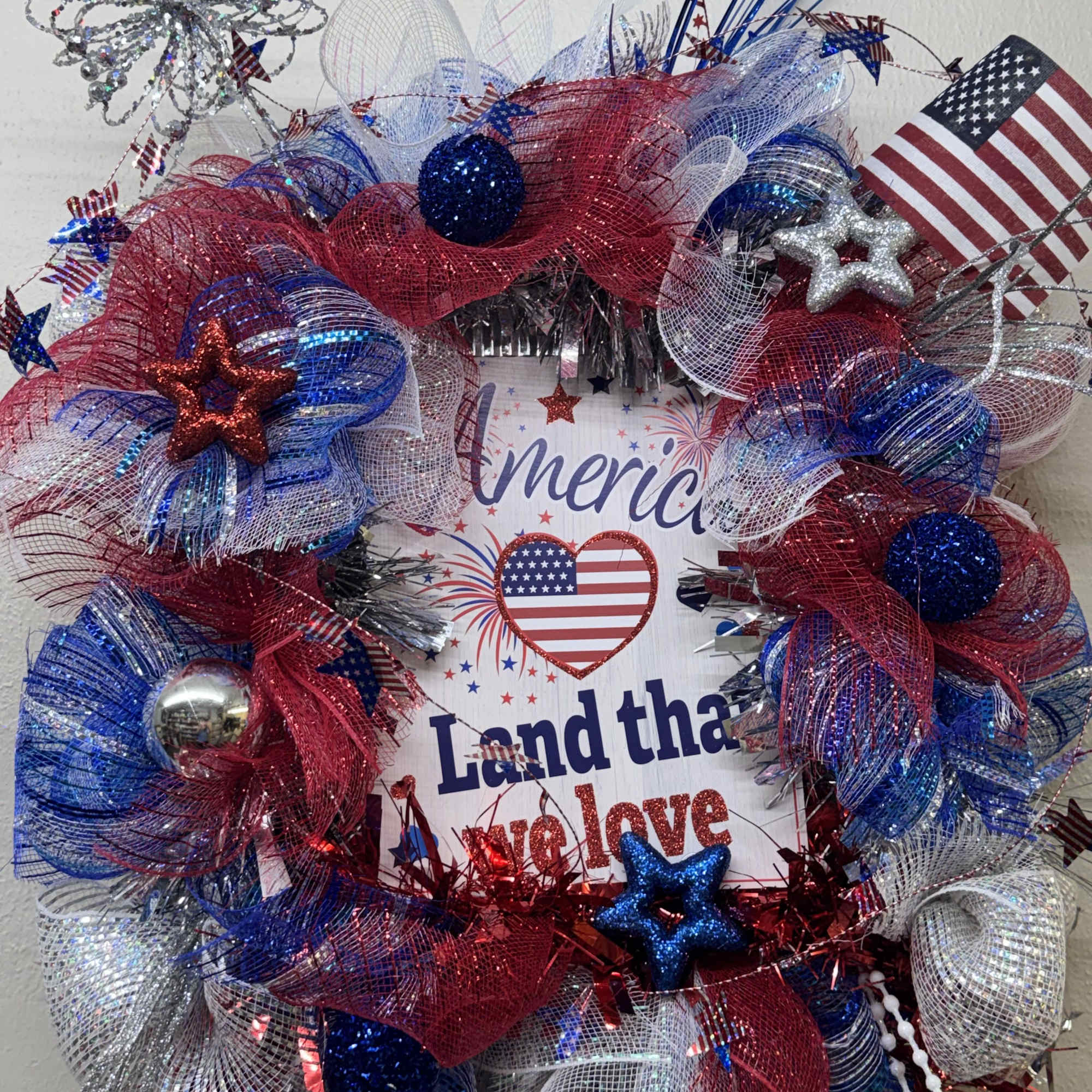 Let's celebrate America with this beautiful one-of-a-kind mesh door wreath! 
