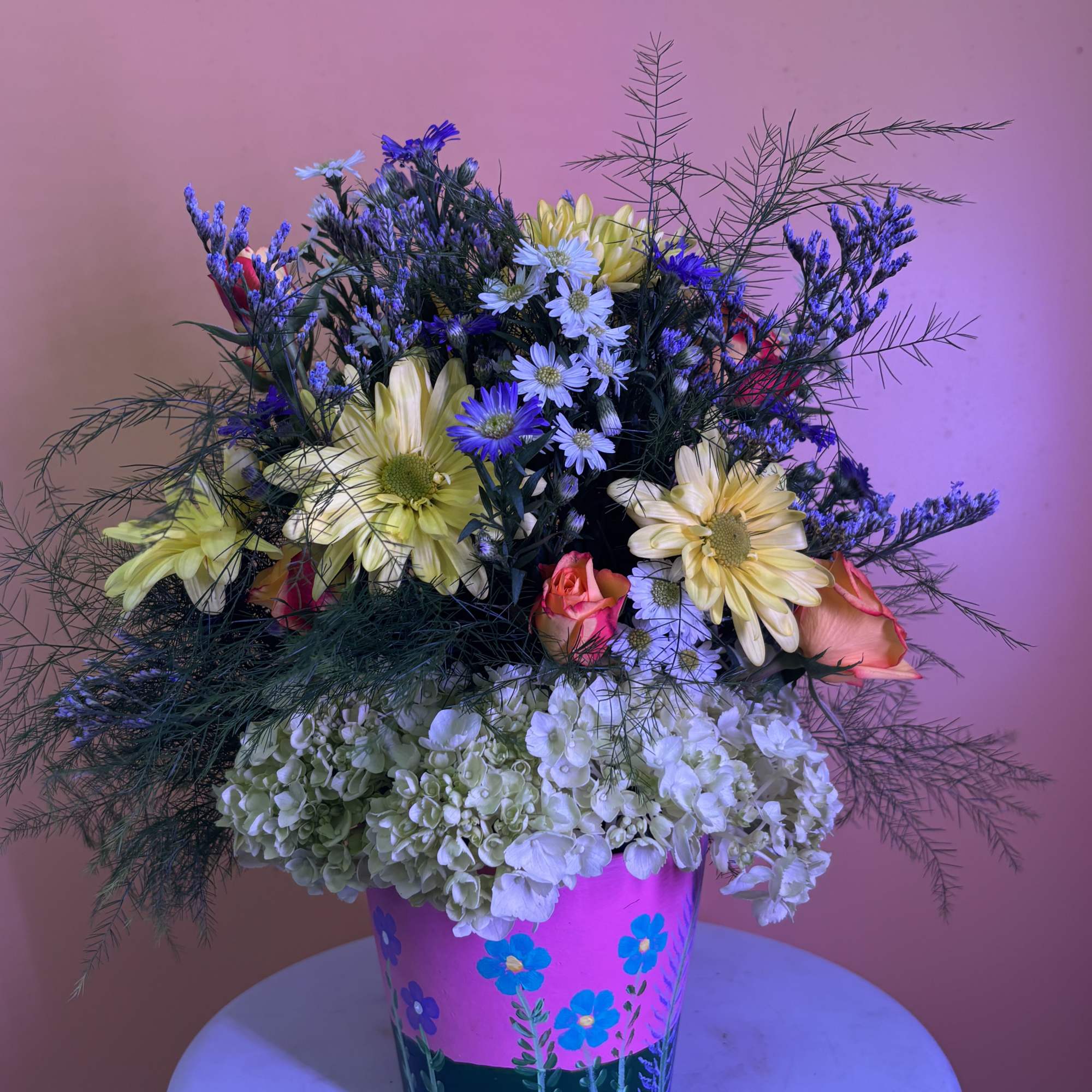 Our local artist Effies Floral Pots has created a line for us