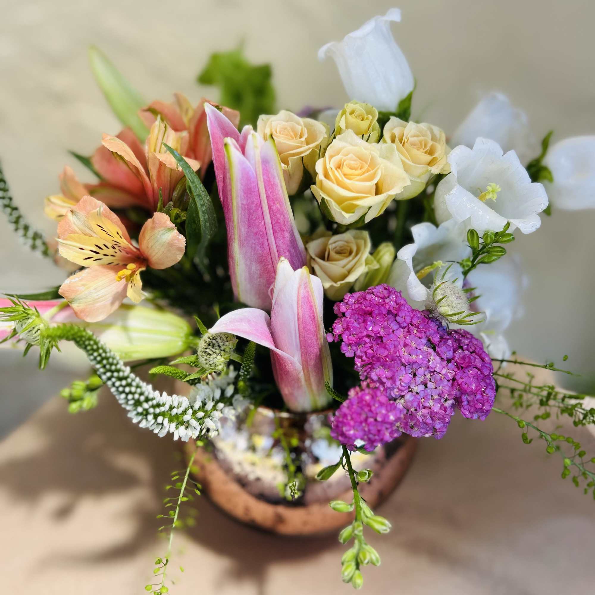 Even more blooms added to make this bouquet large and lush!