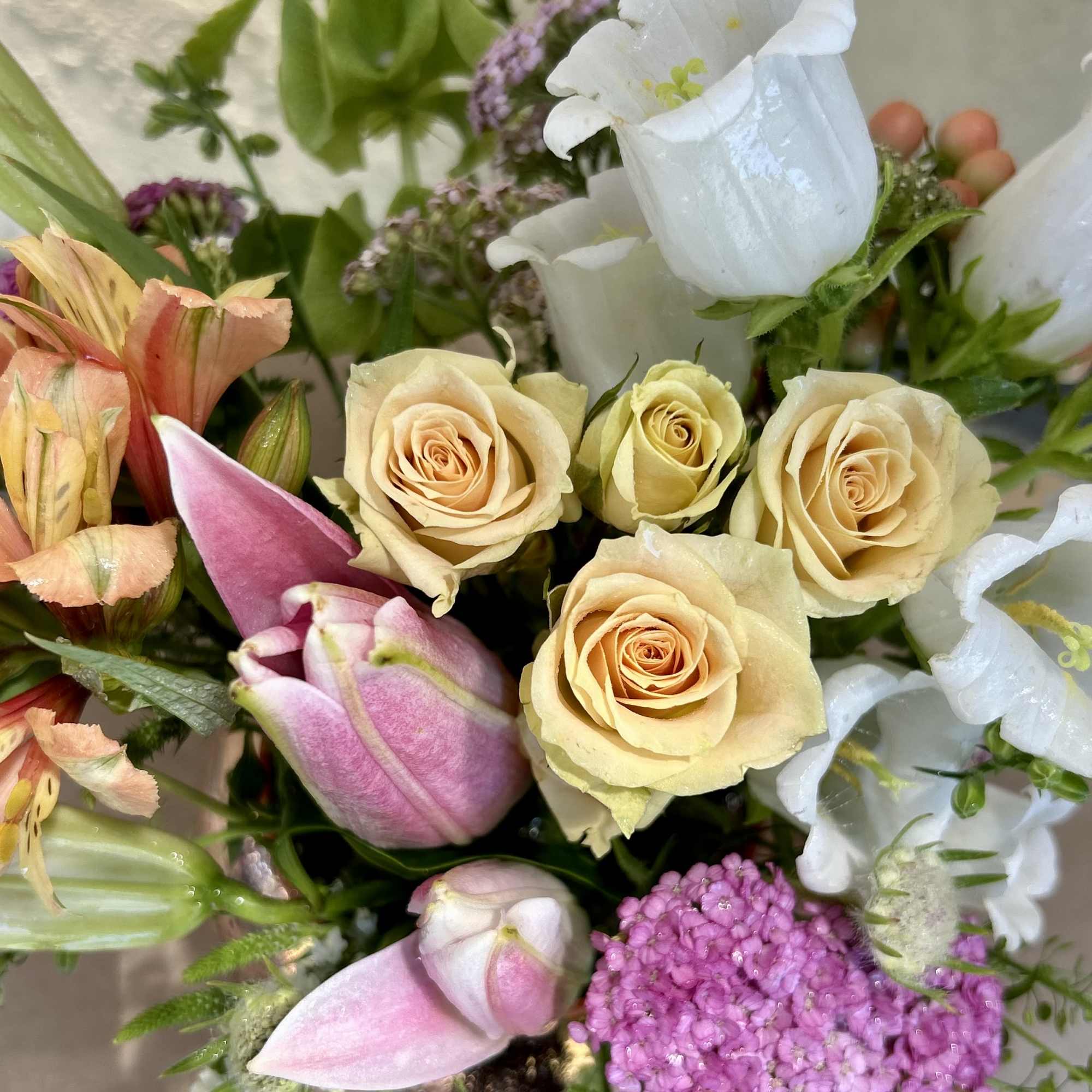 Even more blooms added to make this bouquet large and lush!