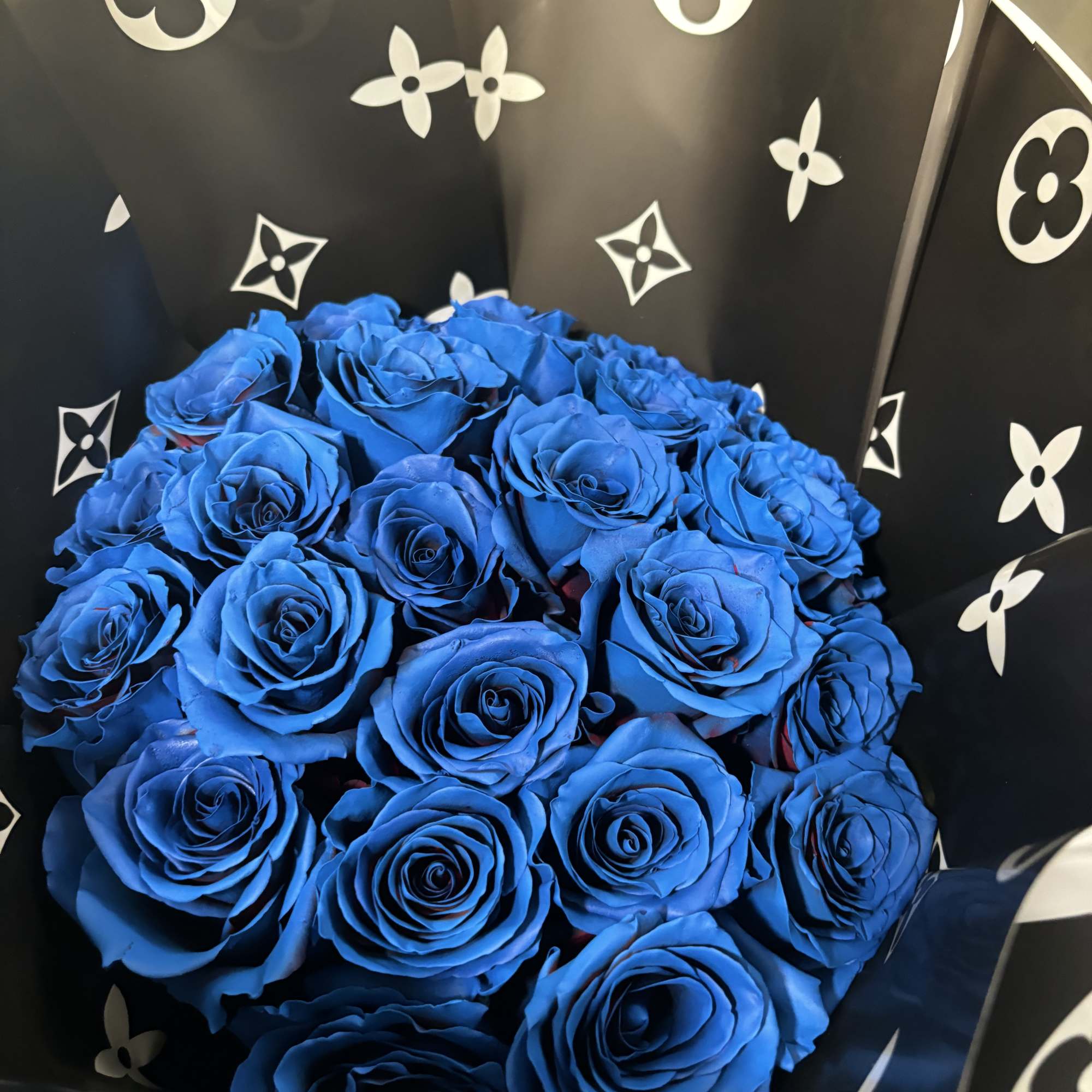 Dive into elegance with our Azure Bliss Bouquet, a captivating blend of