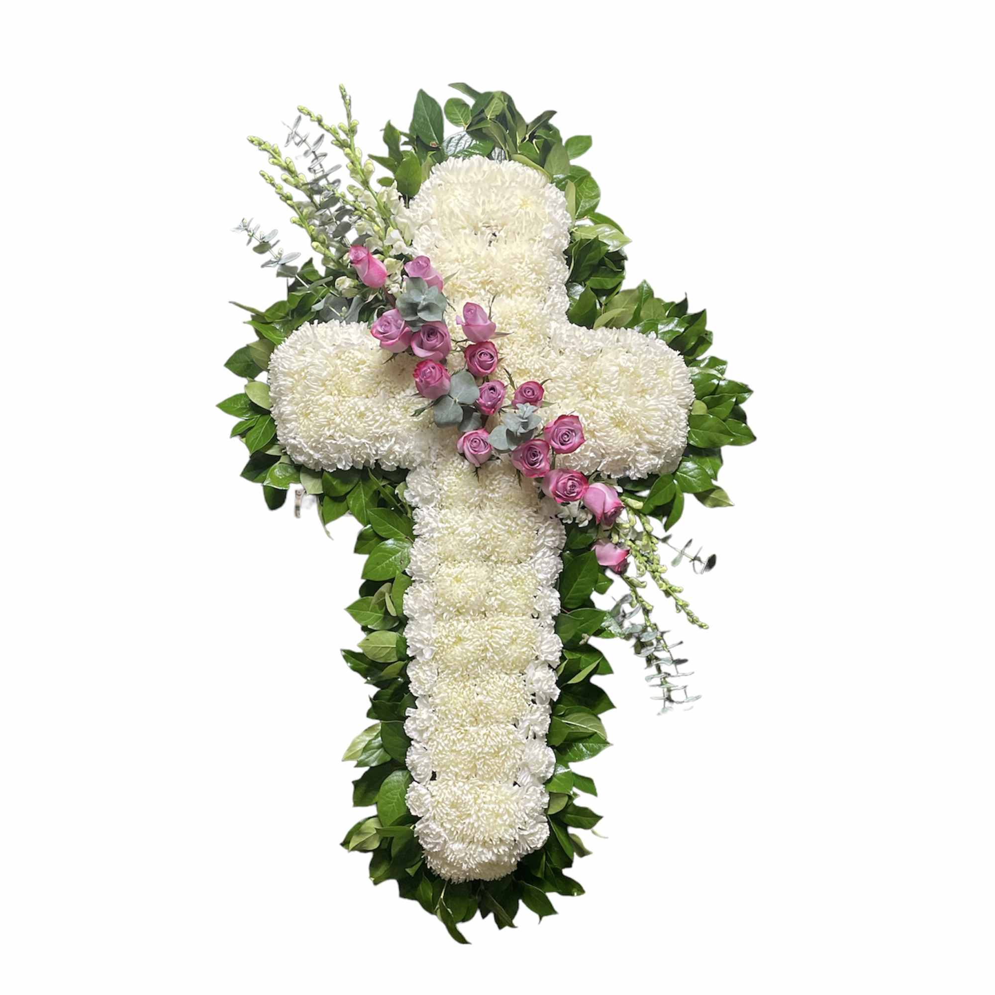 White floral cross with pink roses and greenery