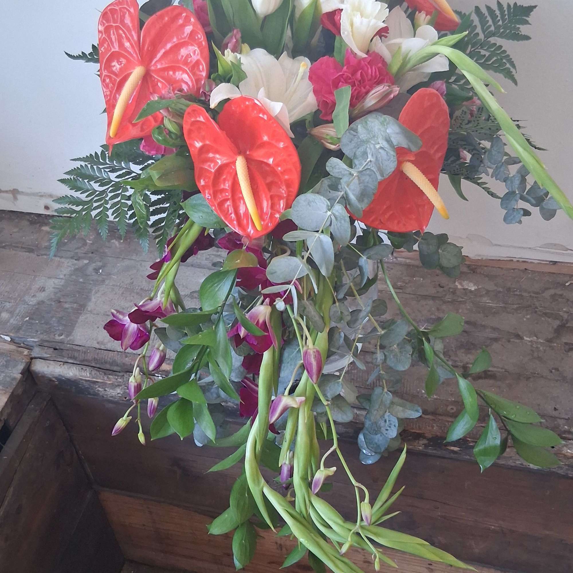 A vibrant, custom‑designed bridal bouquet inspired by the bride&rsquo;s Ecuadorian heritage and