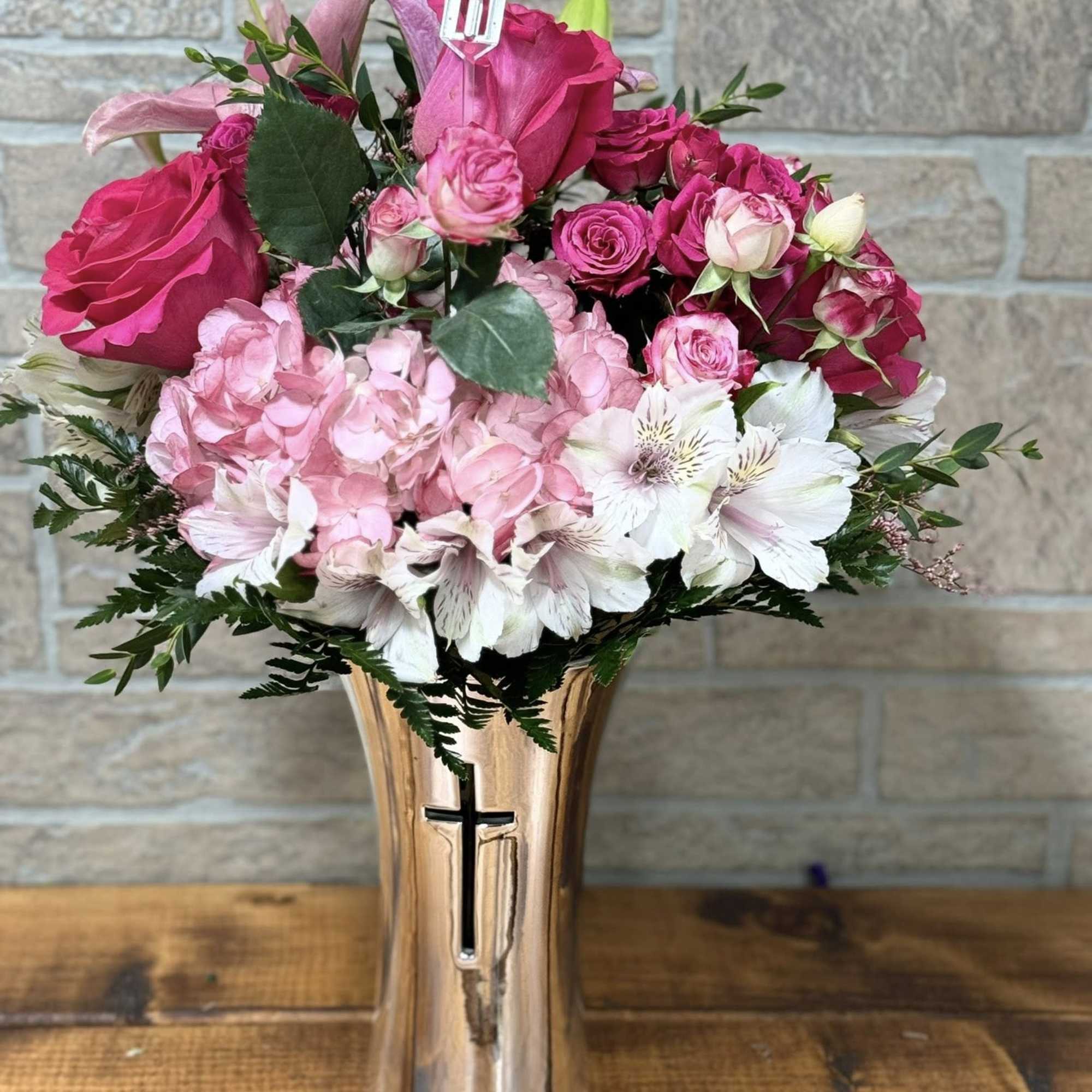 A shining tribute to a life well lived, this bouquet of hydrangeas