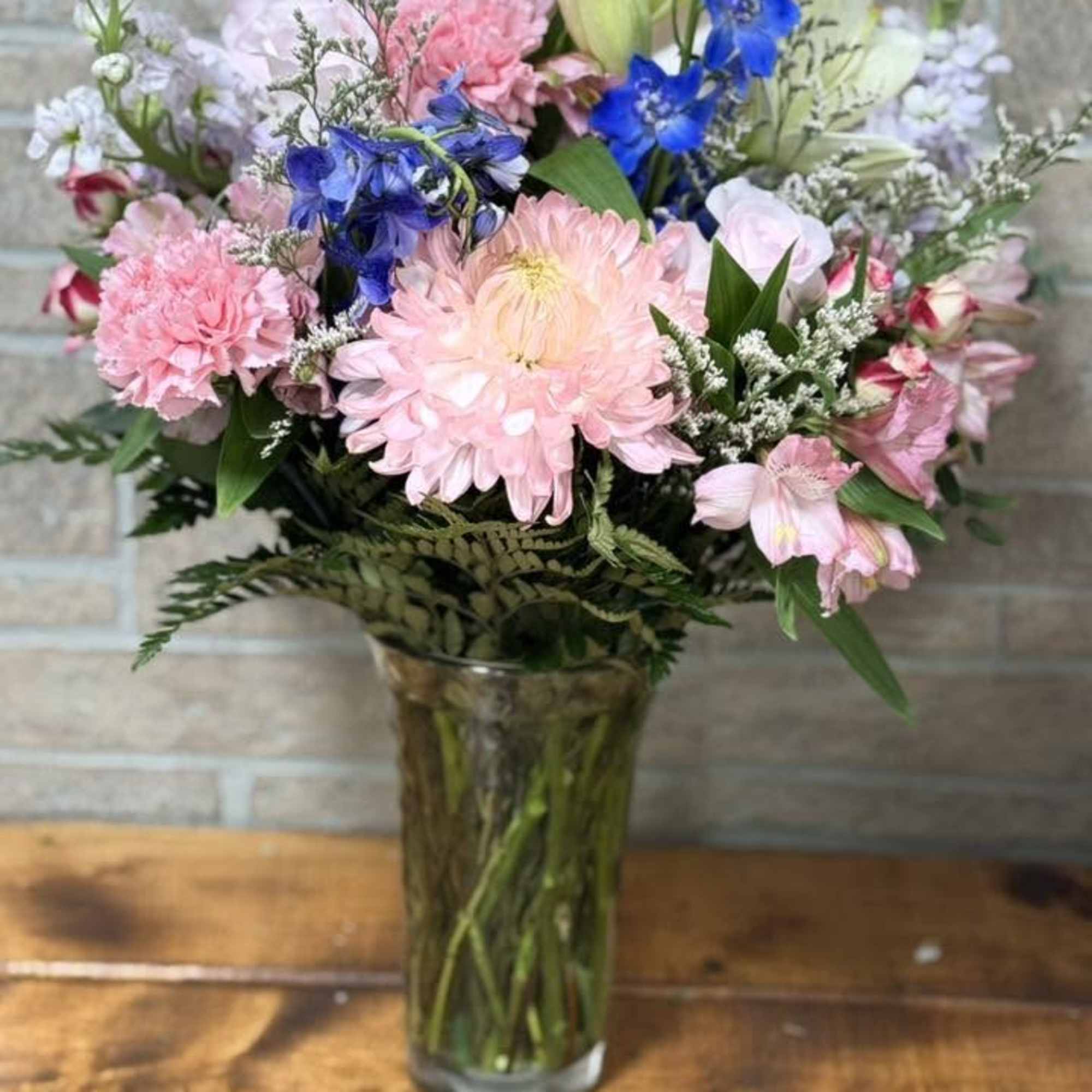 Bring the beauty of a blooming garden indoors with Delphinium Garden, a