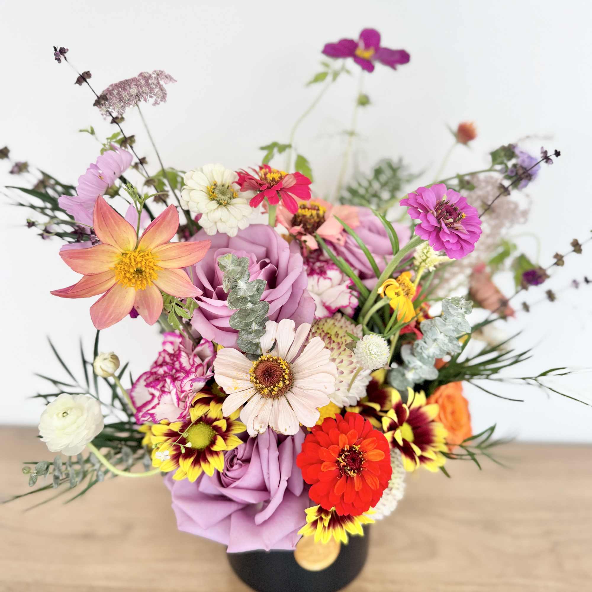 Designed with him in mind, Quiet Confidence is a refined floral composition
