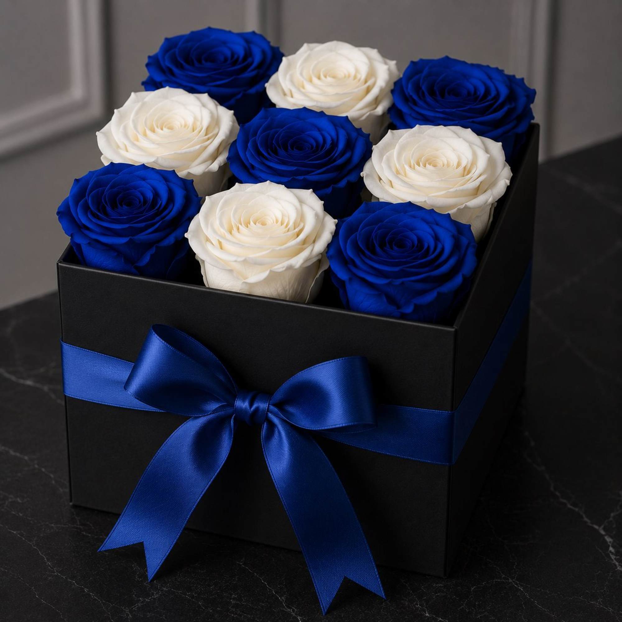 Our Royal Sapphire Box showcases nine stunning fresh blue roses arranged in