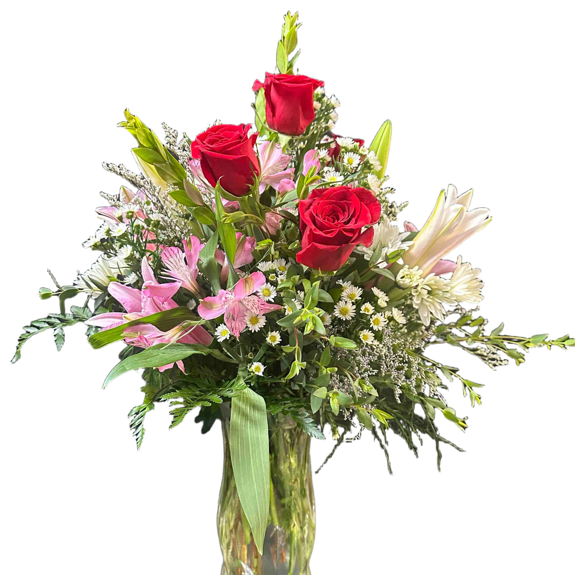 Mix of pink and white flowers including lilies and roses