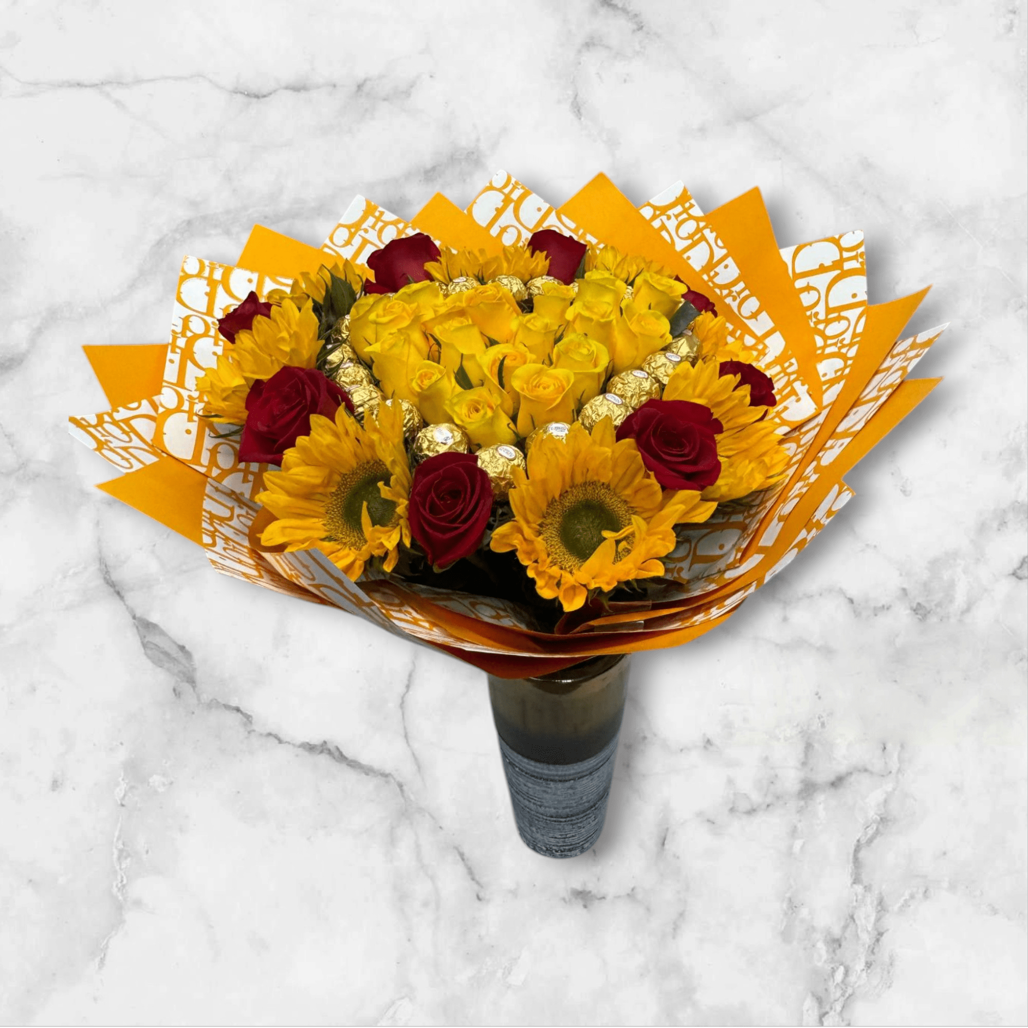 Bouquet of yellow sunflowers and red roses wrapped in orange paper
